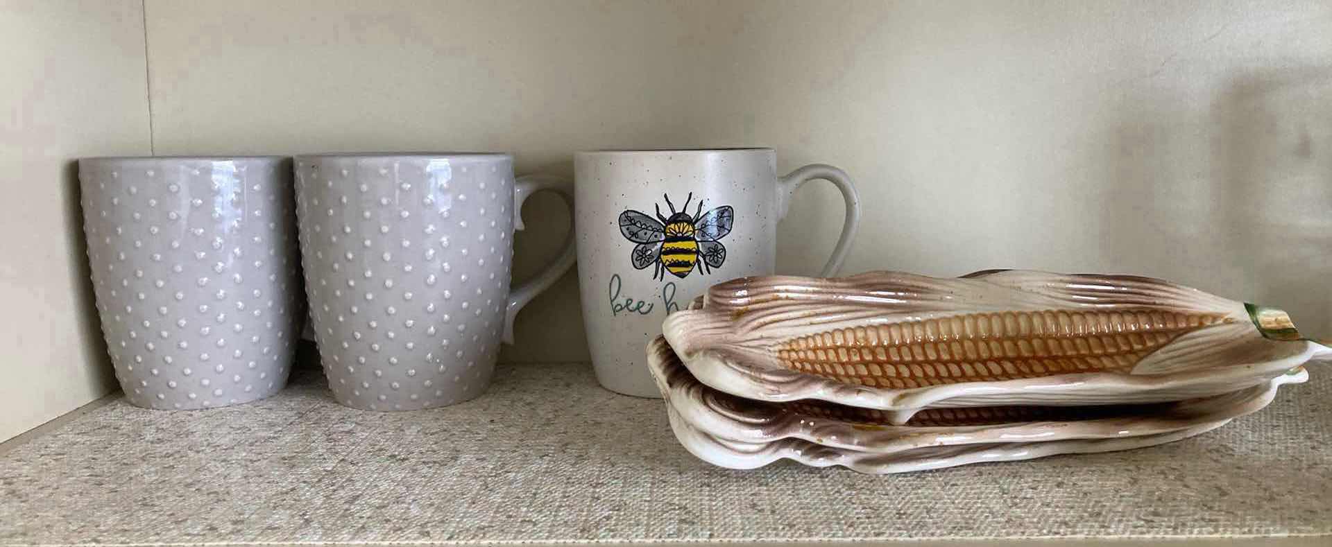 Photo 2 of CONTENTS OF CABINET- MUGS & SERVING DISHES