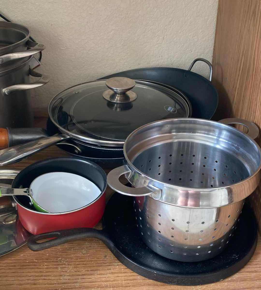 Photo 3 of CONTENTS OF CABINET-POTS, PANS, & CUTTING BOARDS