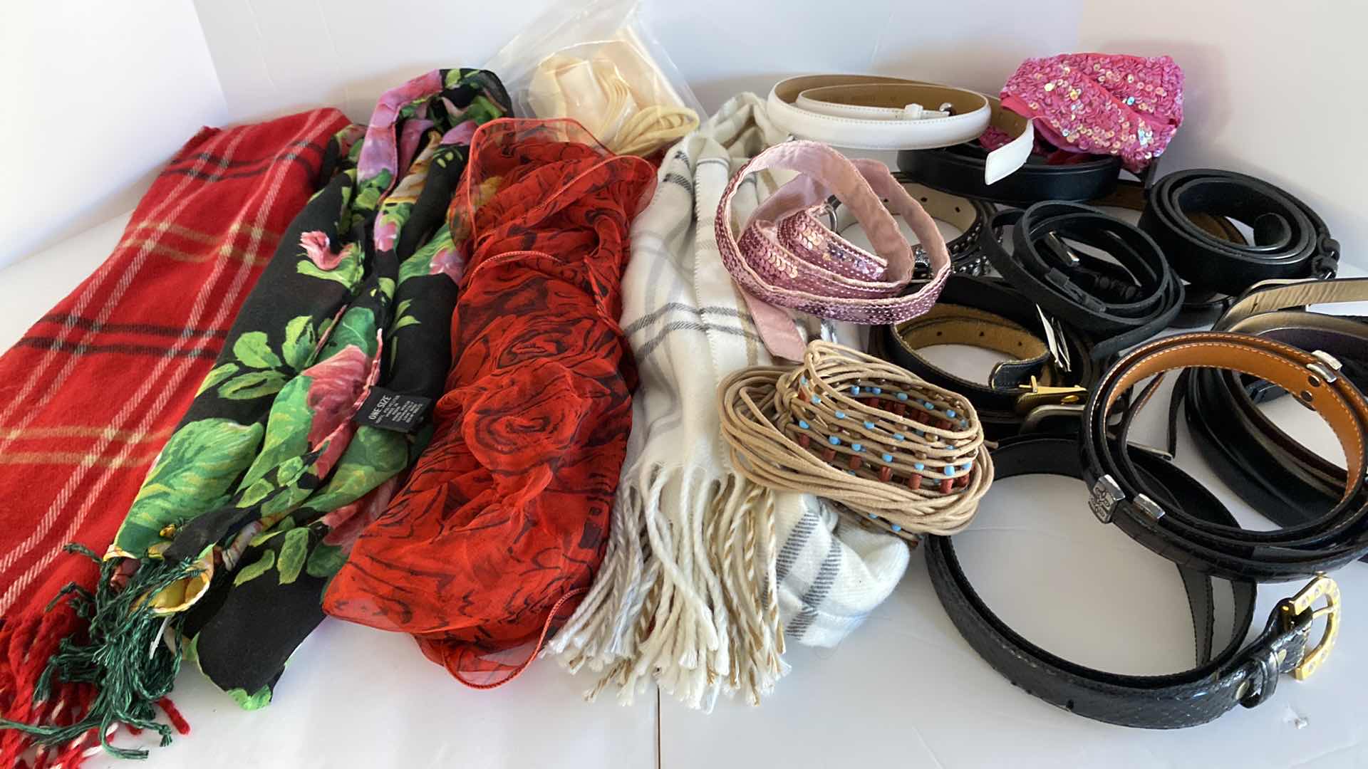 Photo 1 of ASSORTMENT OF SCARFS AND BELTS. BELTS SIZE SMALL AND MEDIUM LADIES