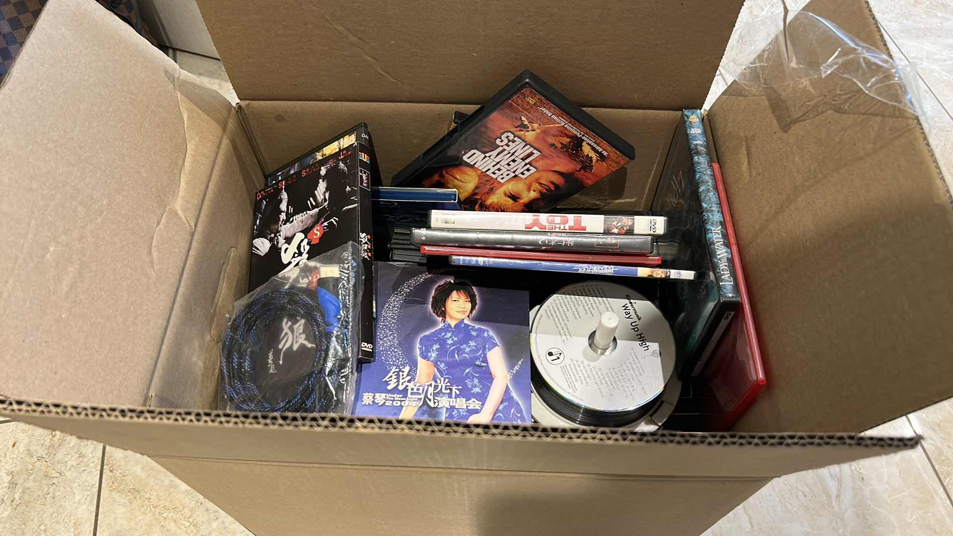 Photo 1 of BOX FULL OF DVD’s AND MORE