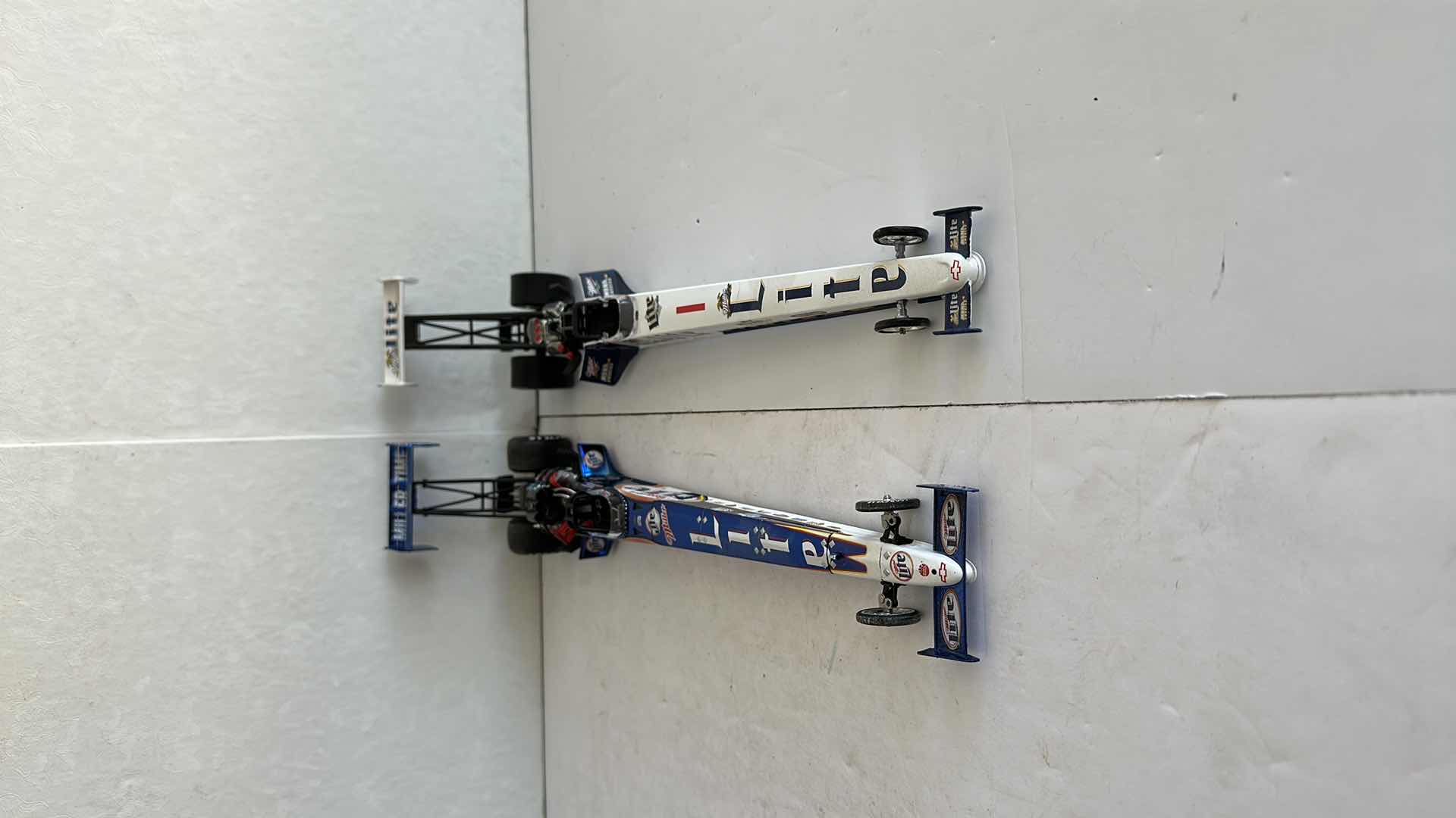 Photo 2 of TWO MILLER LITE DRAGSTERS 16”