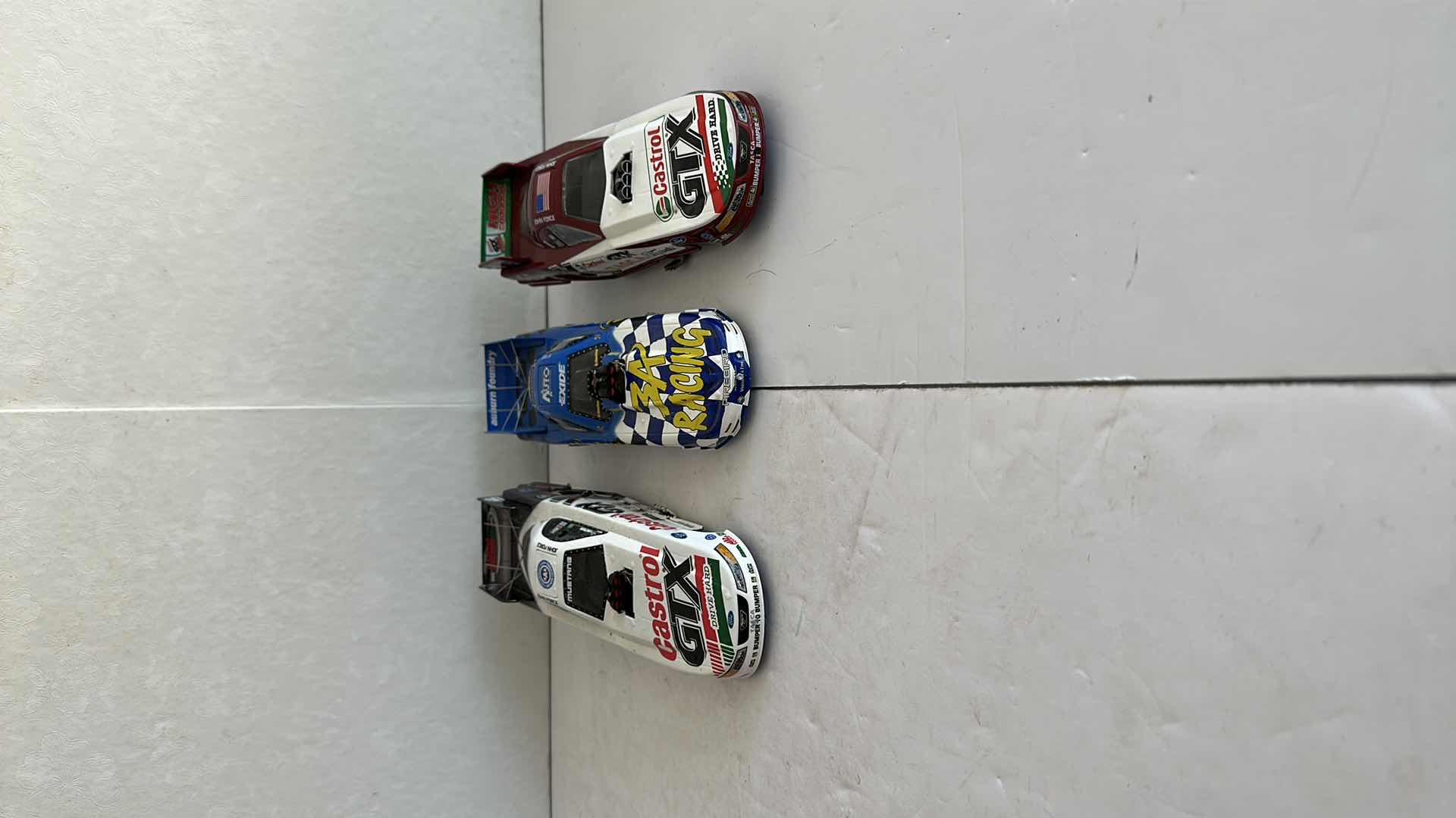 Photo 1 of THREE MODEL RACE CARS 9”