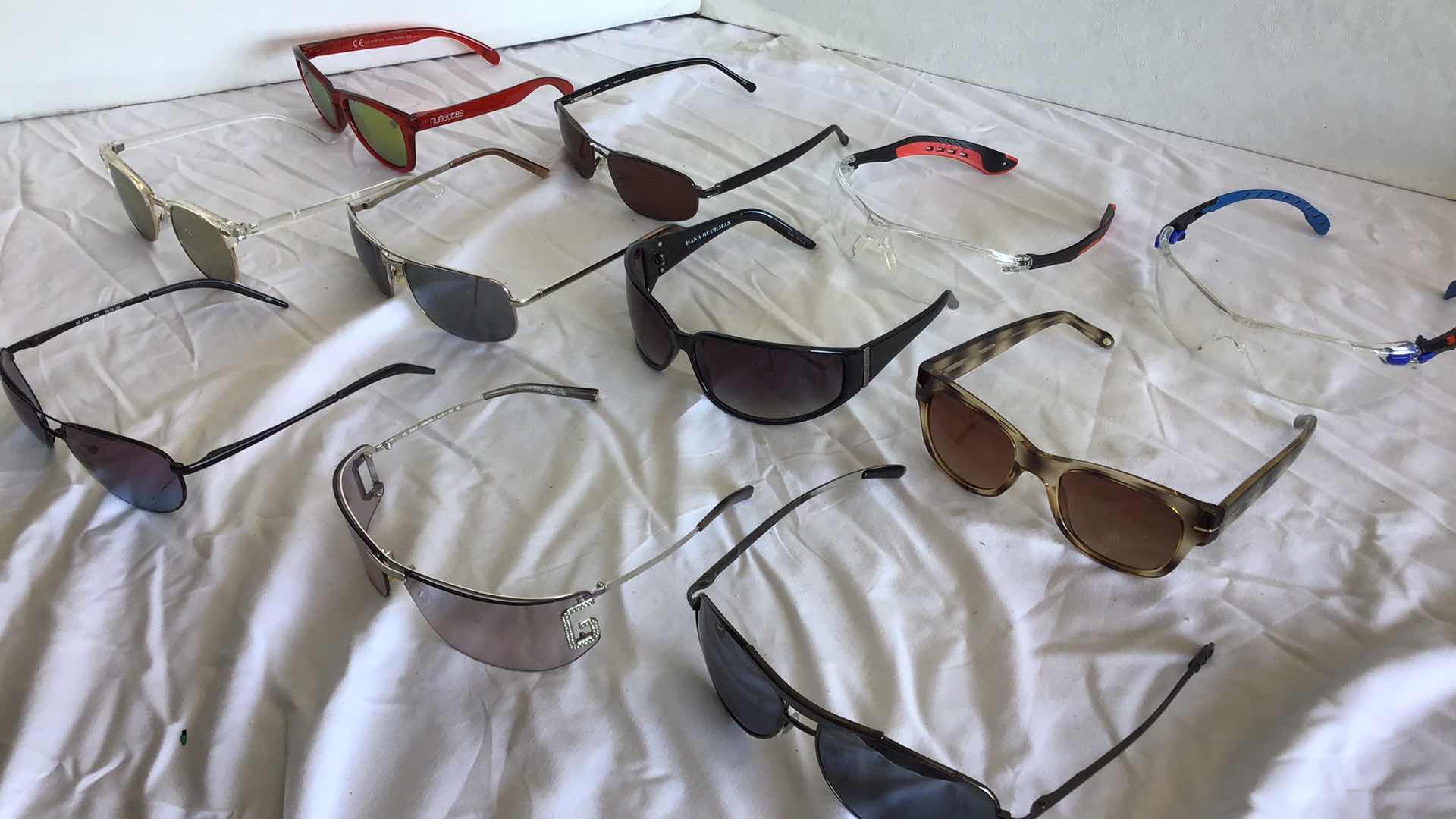 Photo 1 of ASSORTMENT OF 11 PAIRS OF SUNGLASSES (DOLCE&GABBANA, 3M, AZTEC, ETC.)