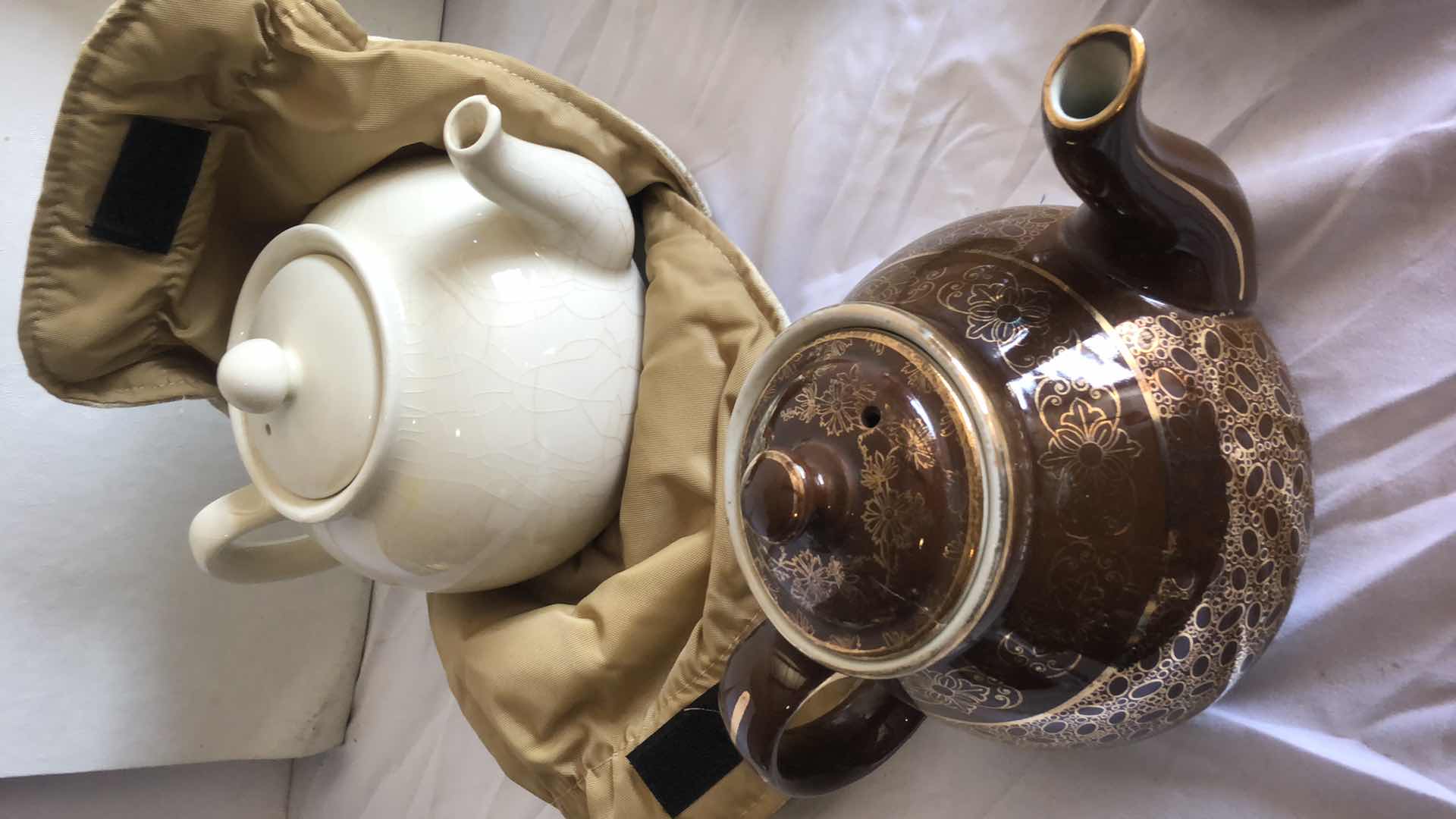 Photo 2 of VINTAGE DINING BUNDLE - SILVER PLATED SILVERWARE, GOLDEN PUPPY COLLECTORS PLATE, 2 BEAUTIFUL TEAPOTS, COASTERS