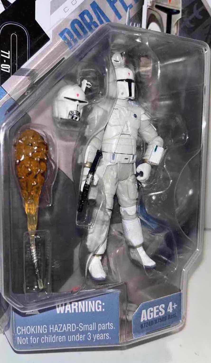 Photo 4 of NEW HASBRO SIGNED BY JEREMY BULLOCH, STAR WARS 30TH ANNIVERSARY MCQUARRIE CONCEPT “BOBA FETT” ACTION FIGURE, ACCESSORIES W COIN, RALPH MCQUARRIE SIGNATURE SERIES #15
(INSIDE PLASTIC PROTECTIVE CASE)