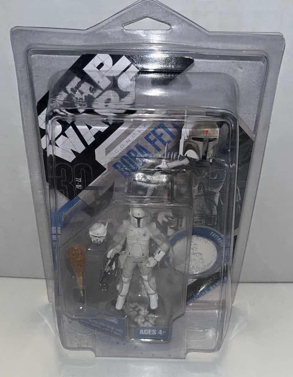 Photo 7 of NEW HASBRO SIGNED BY JEREMY BULLOCH, STAR WARS 30TH ANNIVERSARY MCQUARRIE CONCEPT “BOBA FETT” ACTION FIGURE, ACCESSORIES W COIN, RALPH MCQUARRIE SIGNATURE SERIES #15
(INSIDE PLASTIC PROTECTIVE CASE)