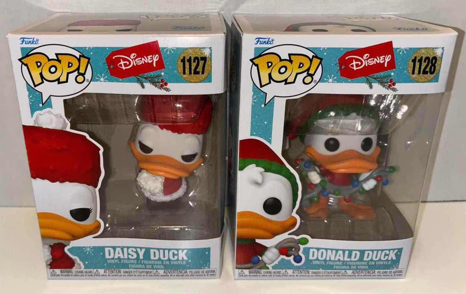 Photo 2 of NEW FUNKO POP! 2021 DISNEY HOLIDAY VINYL FIGURE 2-PACK, #1127 DAISY DUCK & #1128 DONALD DUCK