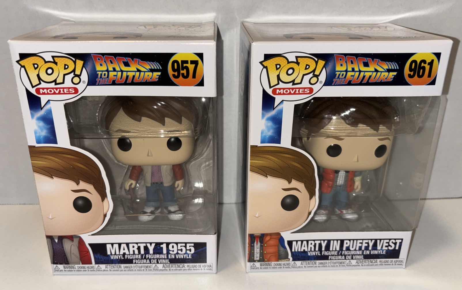 Photo 1 of NEW FUNKO POP! MOVIES VINYL FIGURE, 2-PACK BACK TO THE FUTURE #957 MARTY 1955 & #961 MARTY IN PUFFY VEST