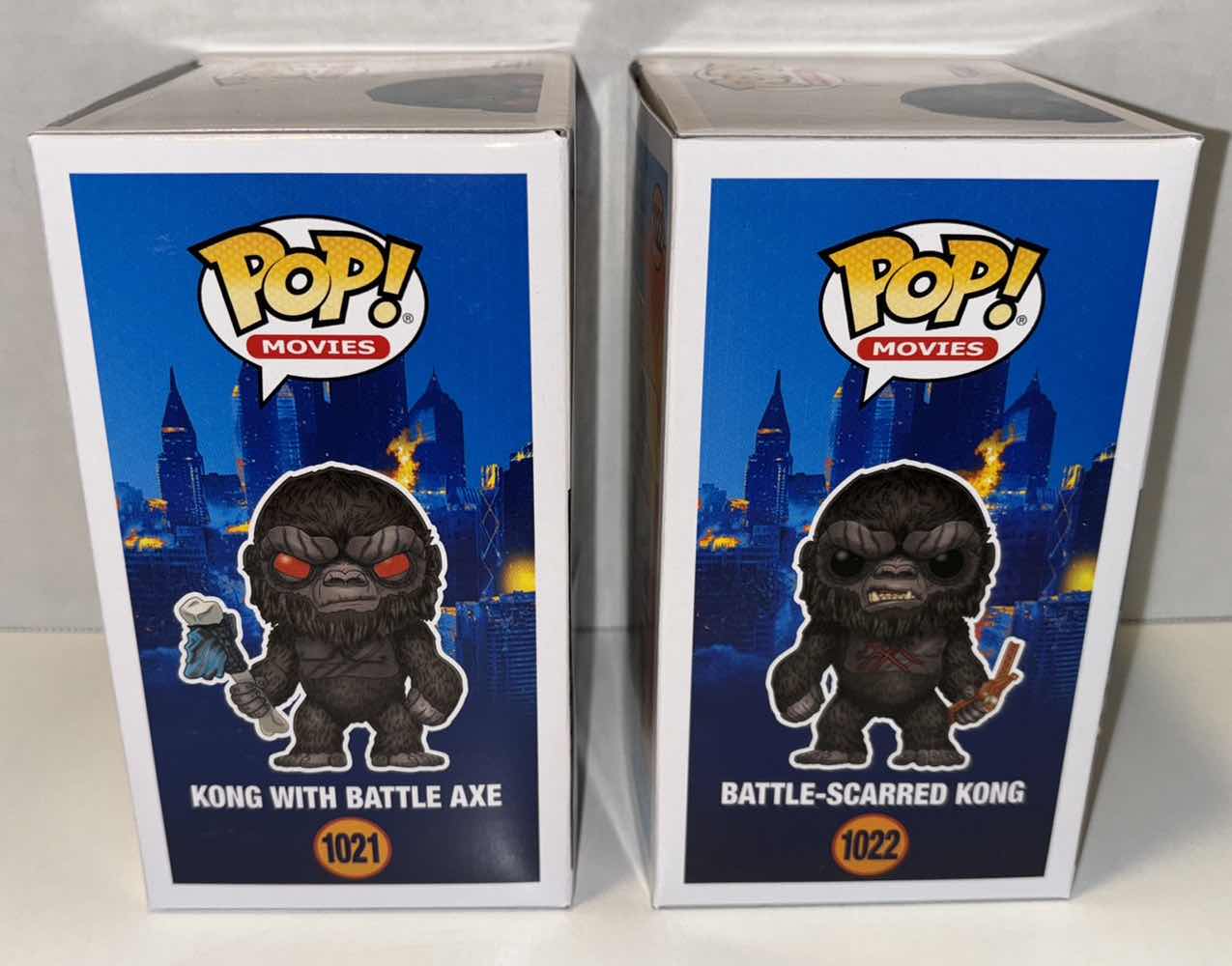 Photo 2 of NEW FUNKO POP! MOVIES VINYL FIGURE, 2-PACK GODZILLA VS KONG #1021 KONG W BATTLE AXE & #1022 BATTLE-SCARRED KONG