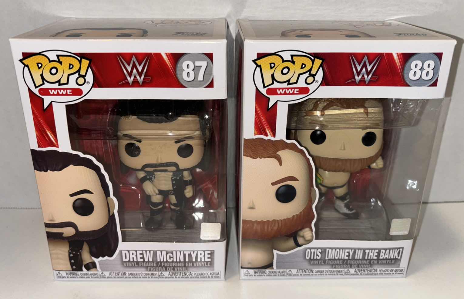 Photo 1 of NEW FUNKO POP! WWE VINYL FIGURE, 2-PACK #87 DREW MCINTYRE & #88 OTIS (MONEY IN THE BANK)