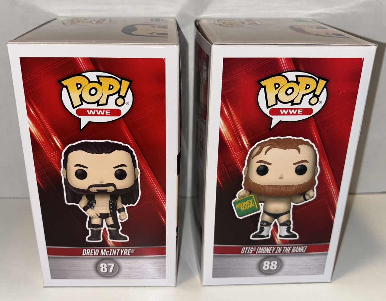 Photo 2 of NEW FUNKO POP! WWE VINYL FIGURE, 2-PACK #87 DREW MCINTYRE & #88 OTIS (MONEY IN THE BANK)