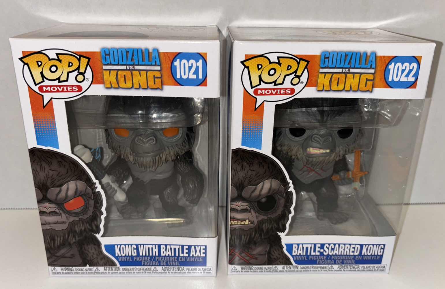 Photo 1 of NEW FUNKO POP! MOVIES GODZILLA VS. KONG VINYL FIGURES, #1021 KONG WITH BATTLE AXE & #1022 BATTLE-SCARRED KONG