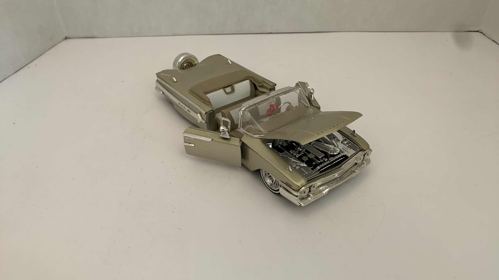 Photo 2 of DIE CAST METAL 1960 CHEVORLET IMPALA 9” X 3” H 2.5”