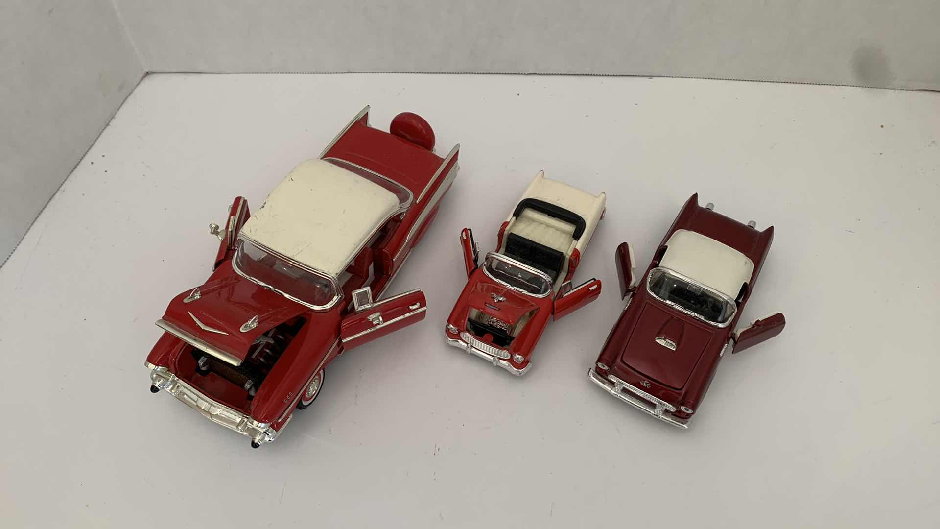 Photo 2 of SET OF 3 DIE CAST METAL 1950S CHEVROLET, LARGEST 9” X 3” H 2.5”