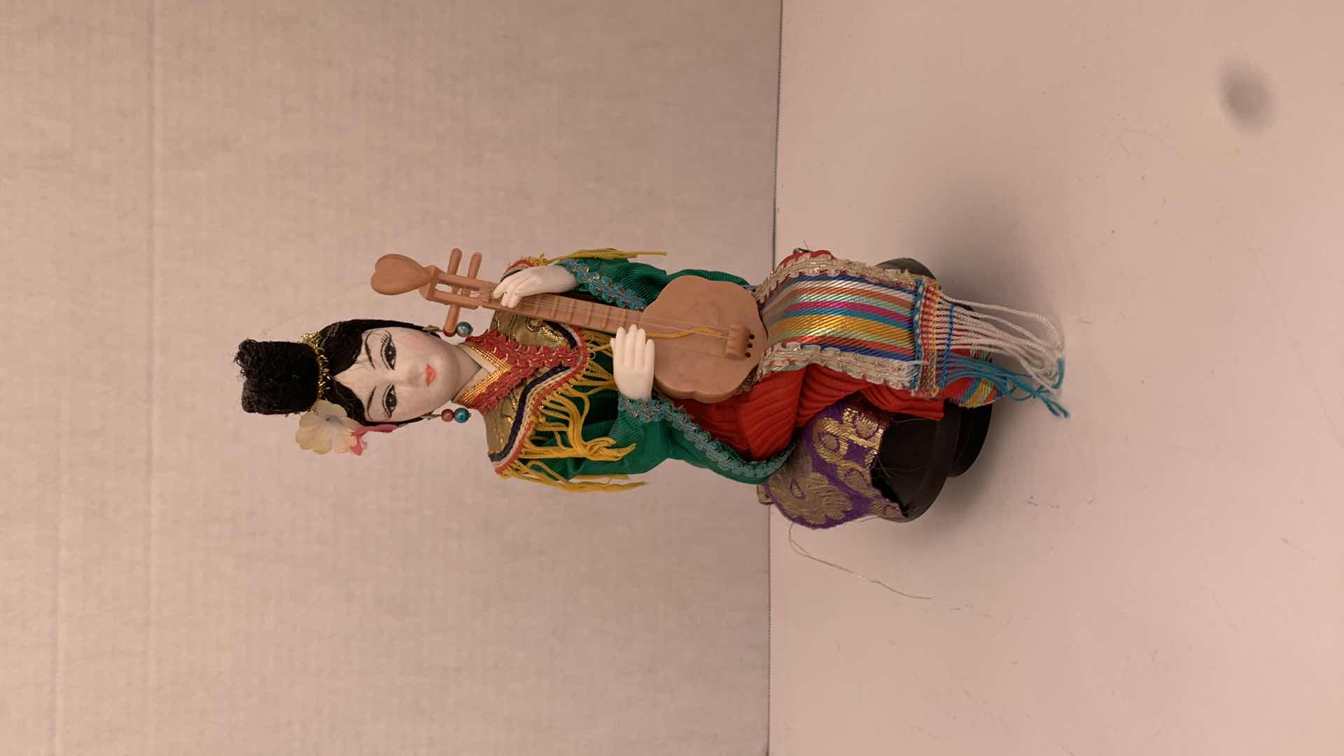 Photo 1 of VINTAGE ROTATING CHINESE DOLL 5” X 5” H 11”