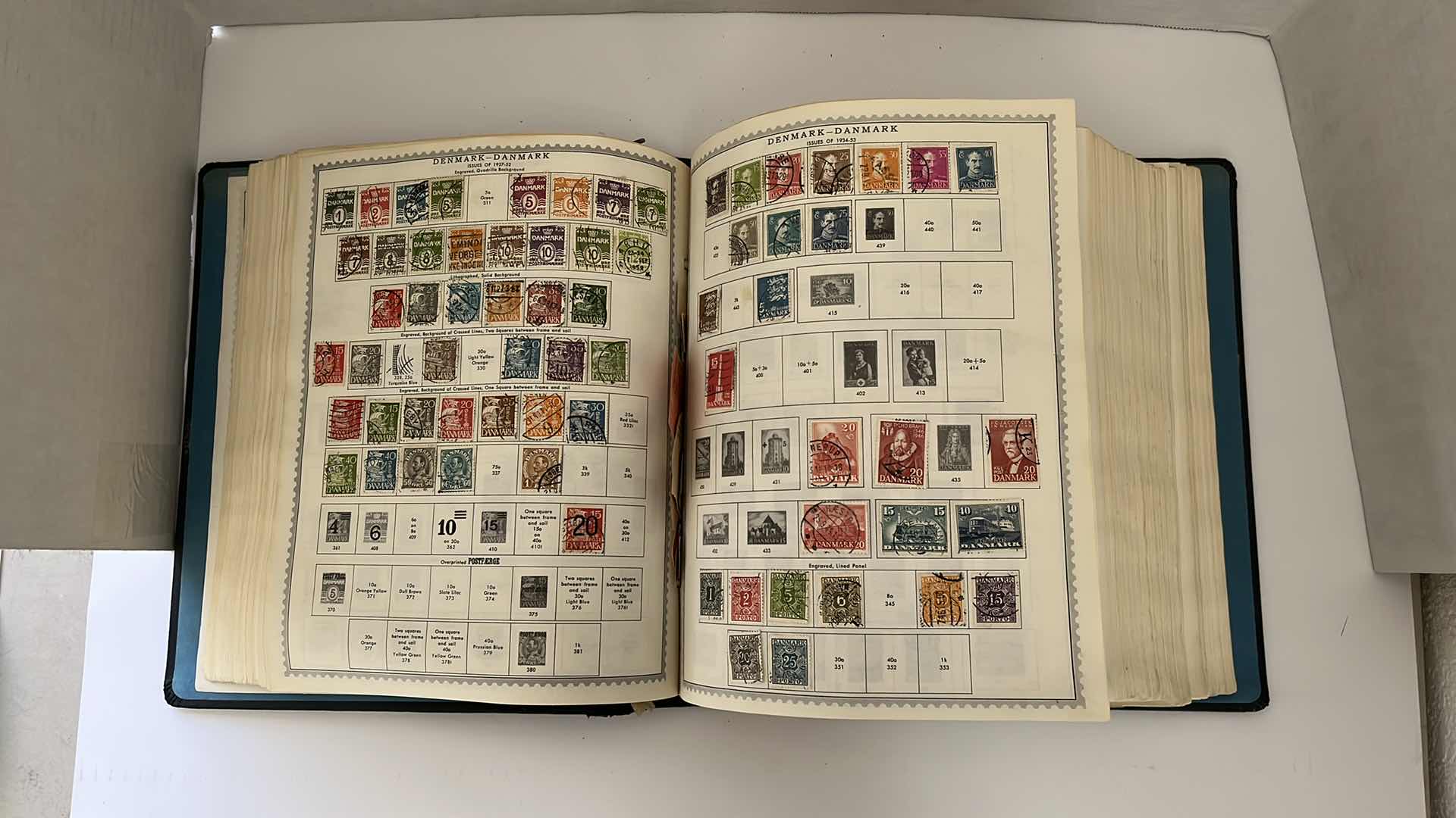 Photo 6 of GLOBAL STAMP ALBUM CONTAINING VINTAGE STAMPS