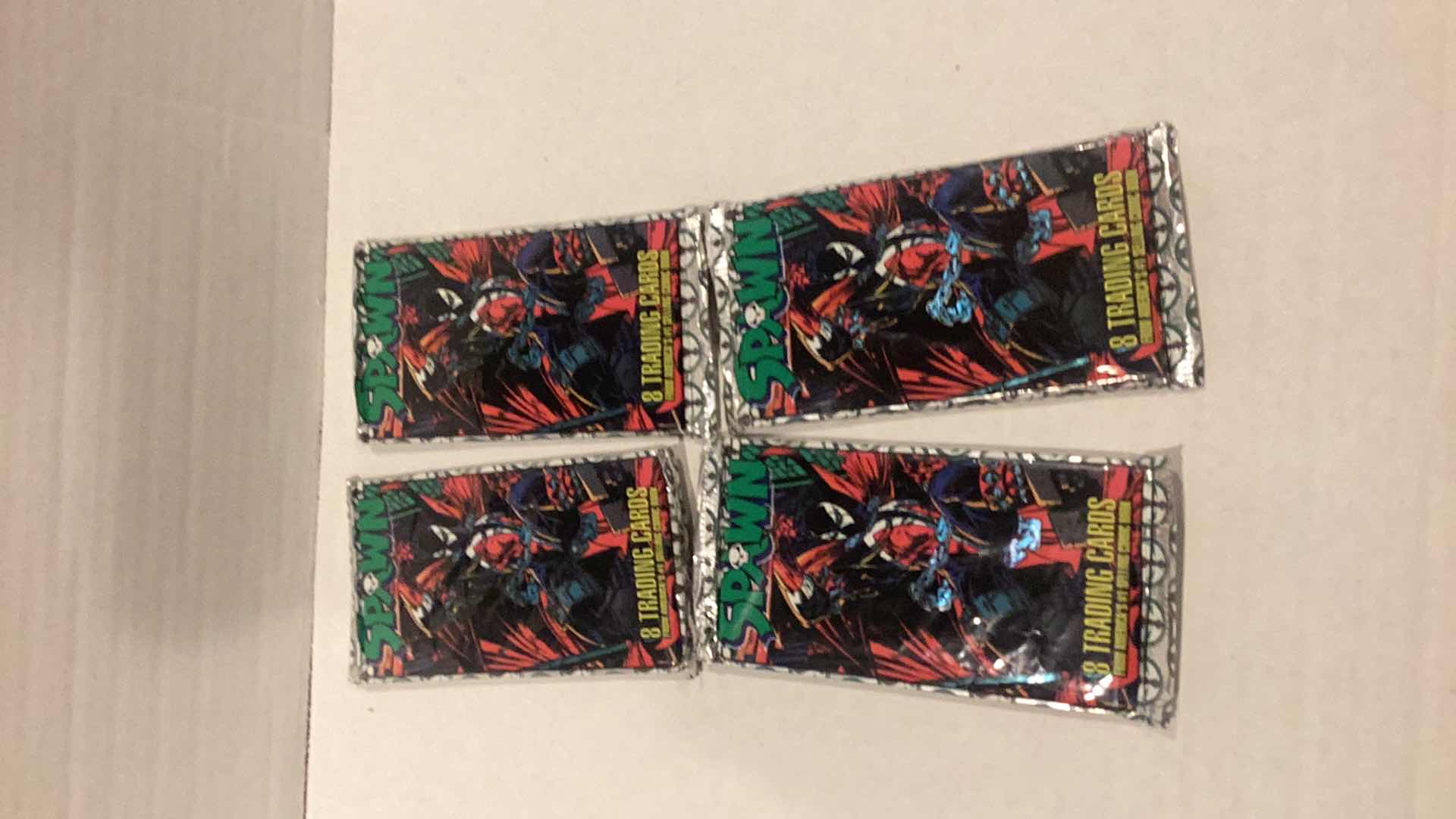 Photo 1 of FOUR PACKS OF SPAWN TRADING CARDS 1995