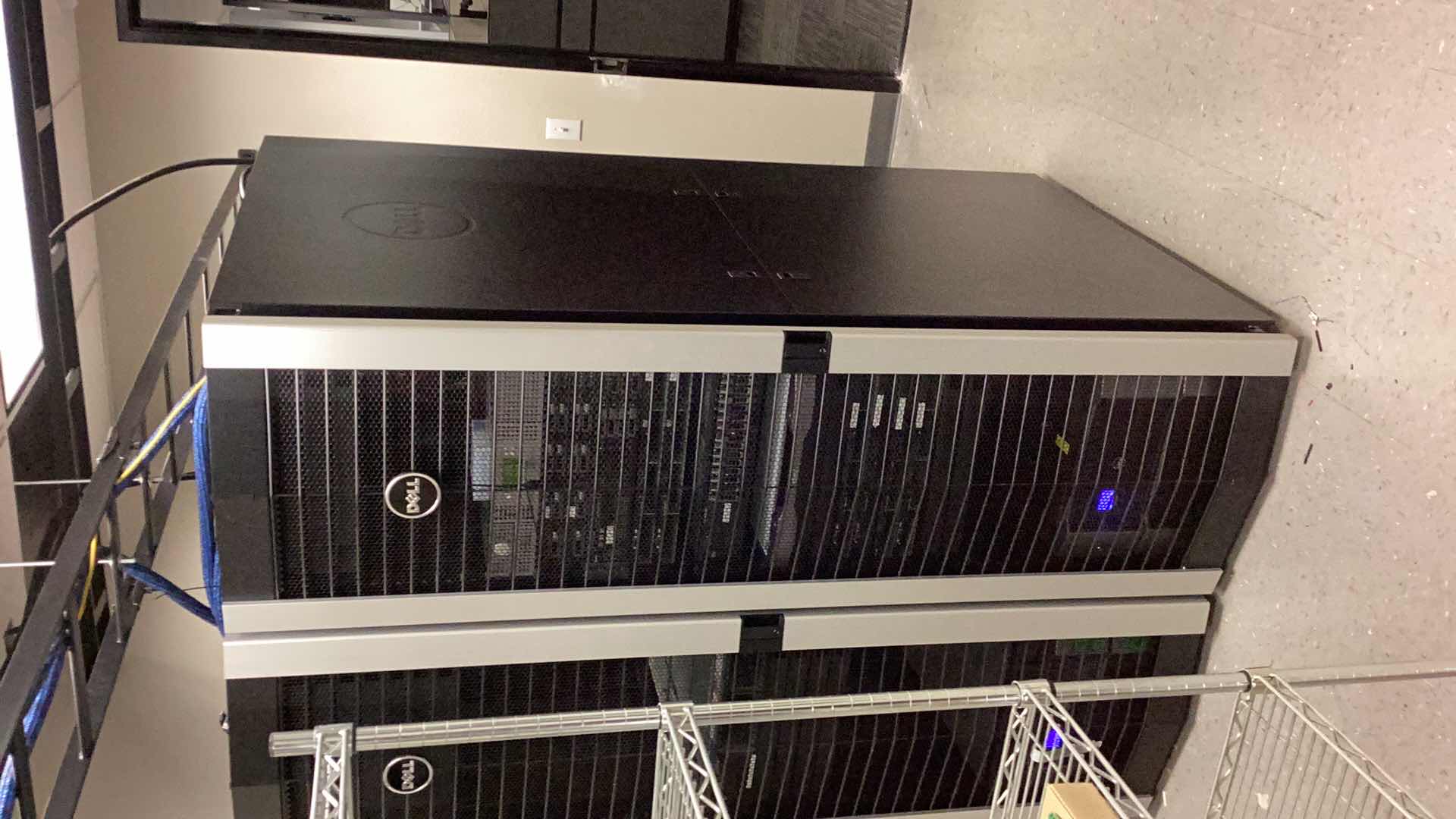 Photo 1 of DELL SERVER RACK WITH PULL OUT CONFIGURATION TRAY 24” X 36” H 79” COMPONENTS NOT INCLUDED  (BUYER TO DISASSEMBLE & REMOVE FROM 2ND STORY OFFICE BUILDING W ELEVATOR)