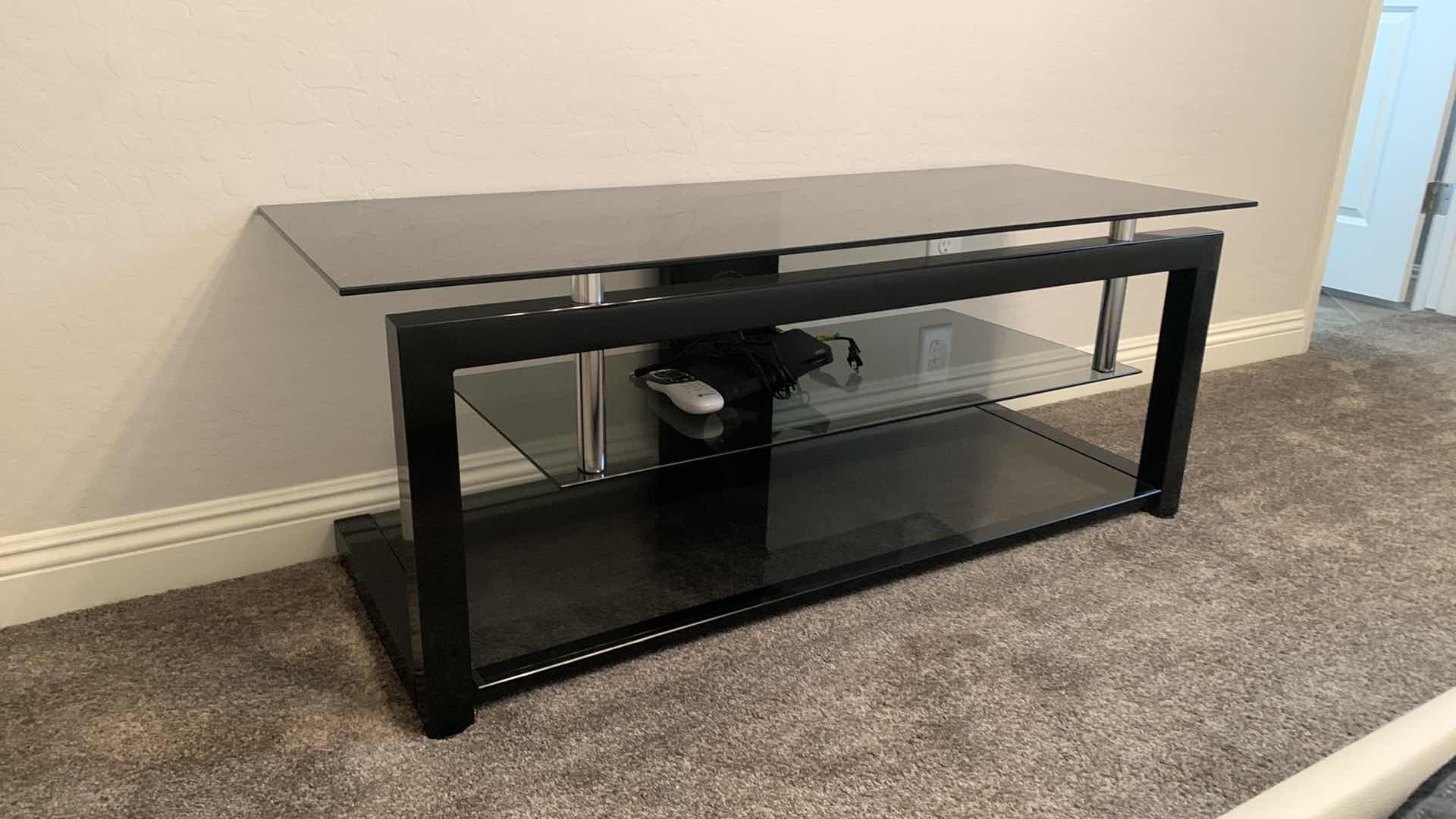 Photo 5 of BLACK SMOKED GLASS W CHROME ENTERTAINMENT CONSOLE (ELECTRONICS AND SOUND SYSTEMS NOT INCLUDED) 52” x 20” x H20”