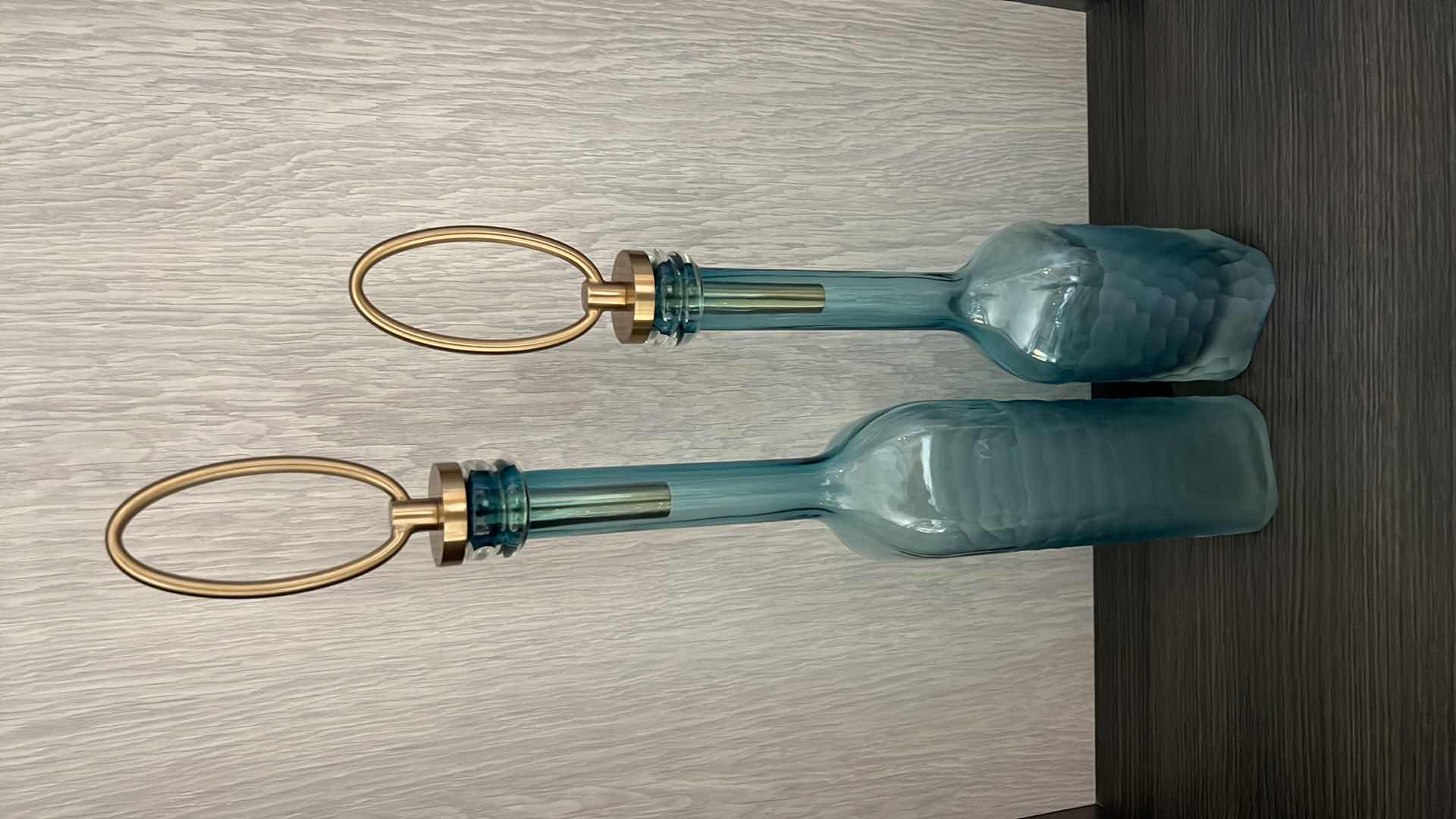 Photo 1 of 2-UTTERMOST GREEN GLASS BOTTLES W COFFEE BRONZE METAL STOPPER H25” & 22”