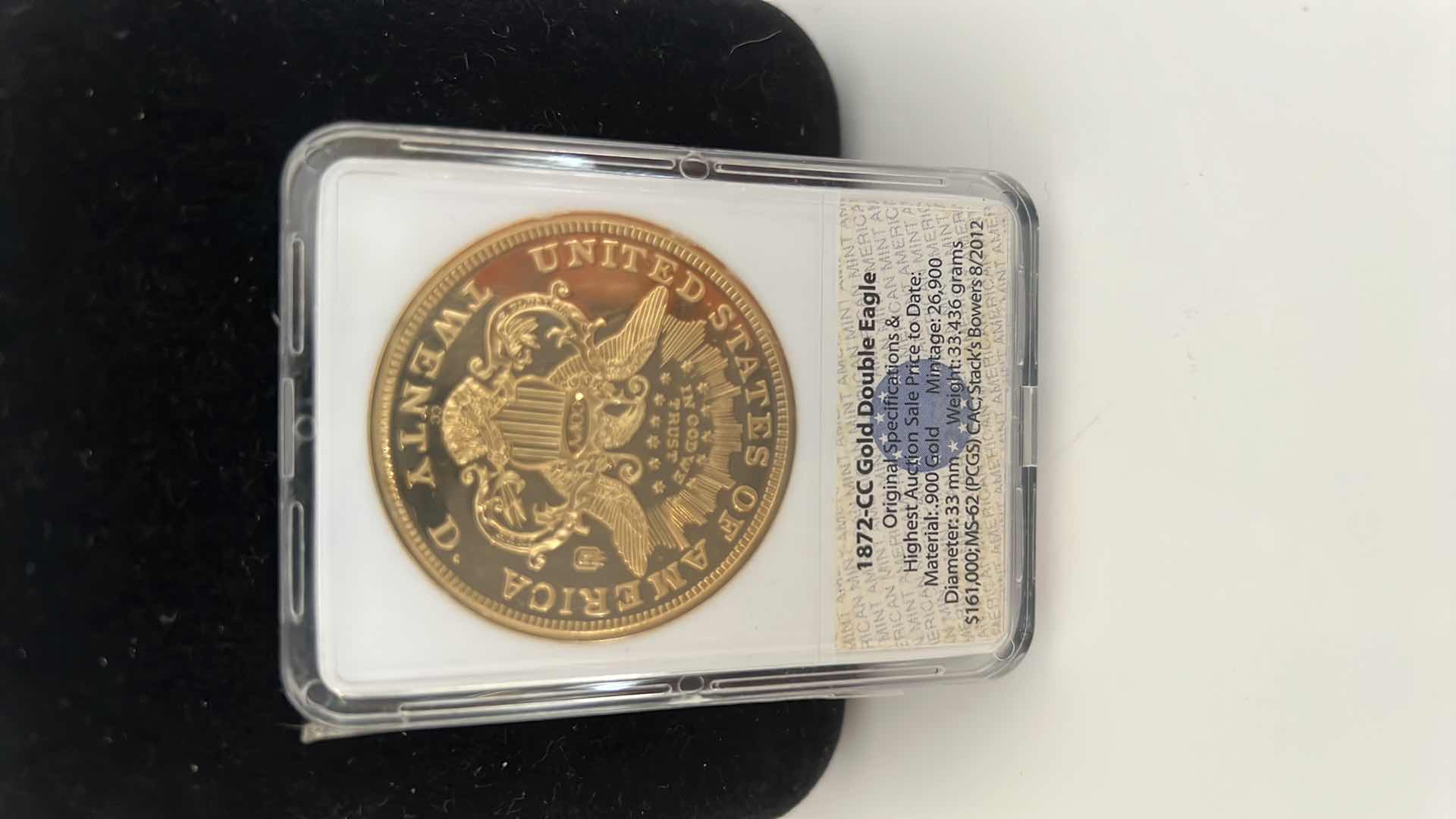 Photo 2 of COLLECTORS 1872-CC GOLD EAGLE REPLICA 24K LAYERED IN GOLD COIN
