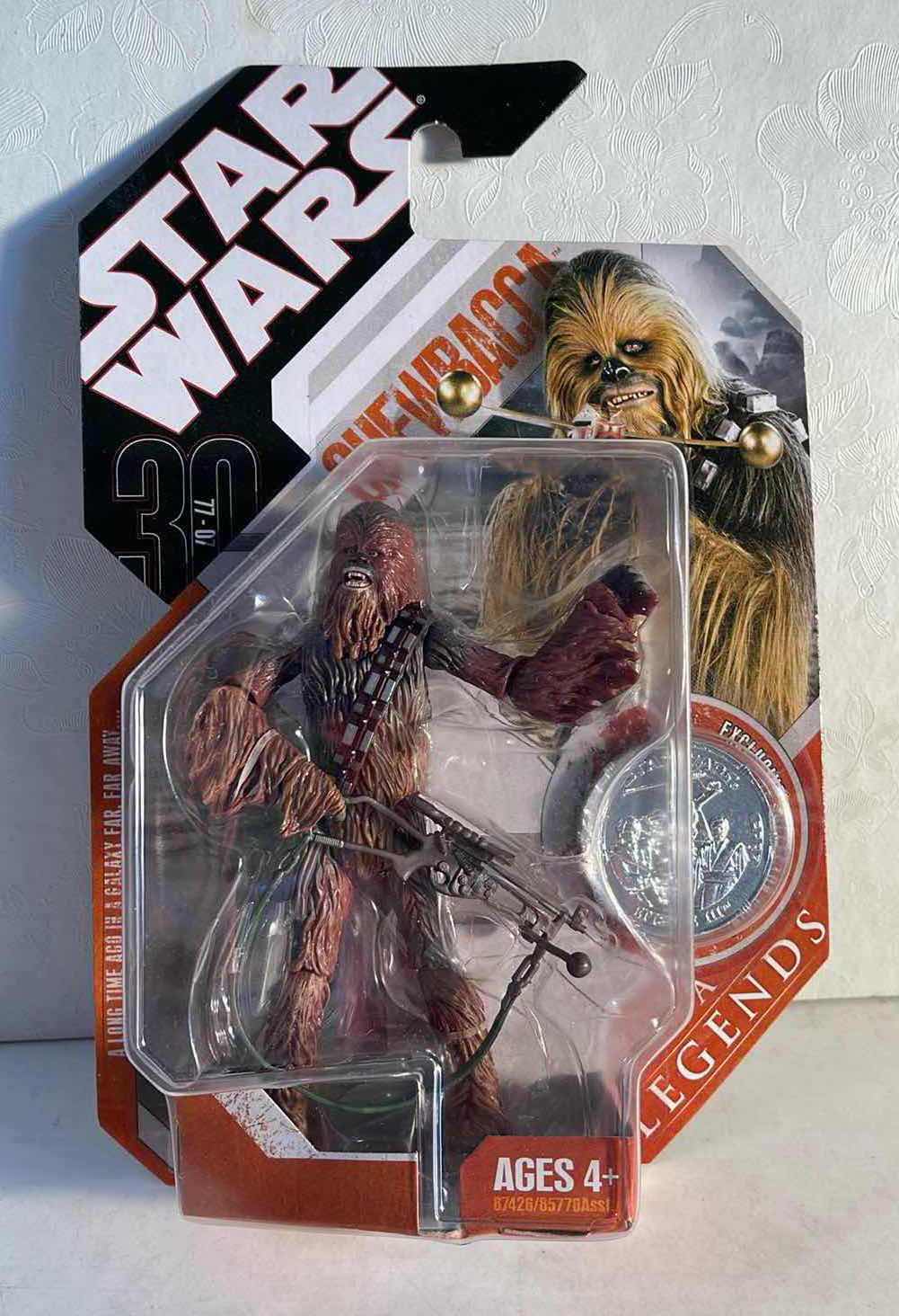 Photo 1 of NIB STAR WARS SAGA LEGENDS 30TH ANNIVERSARY “CHEWBACCA” FIGURE W/ SILVER COIN - RETAIL PRICE $16.99