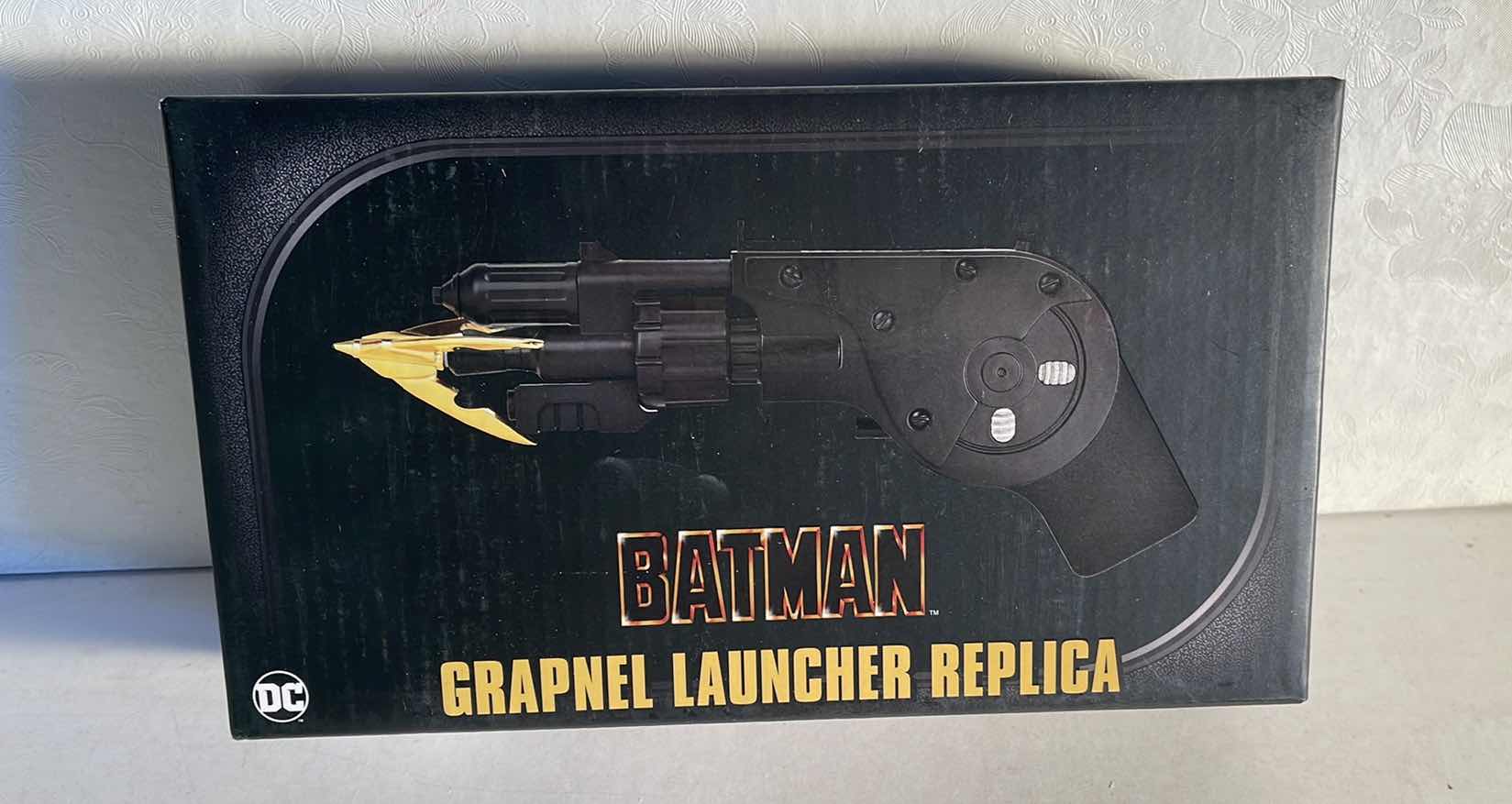 Photo 1 of NIB BAT MAN GRAPNEL LAUNCHER REPLICA - RETAIL PRICE $36.99