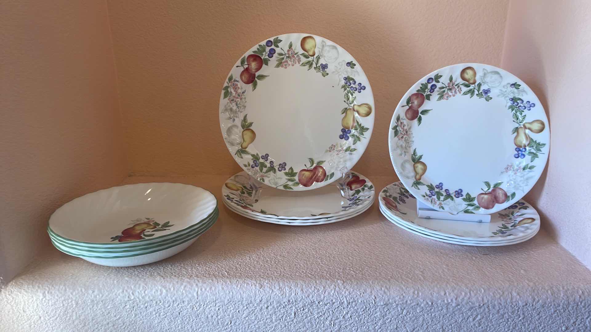 Photo 1 of CORELLE BY CORNING 12PC PLATE SET 
3 CUPS