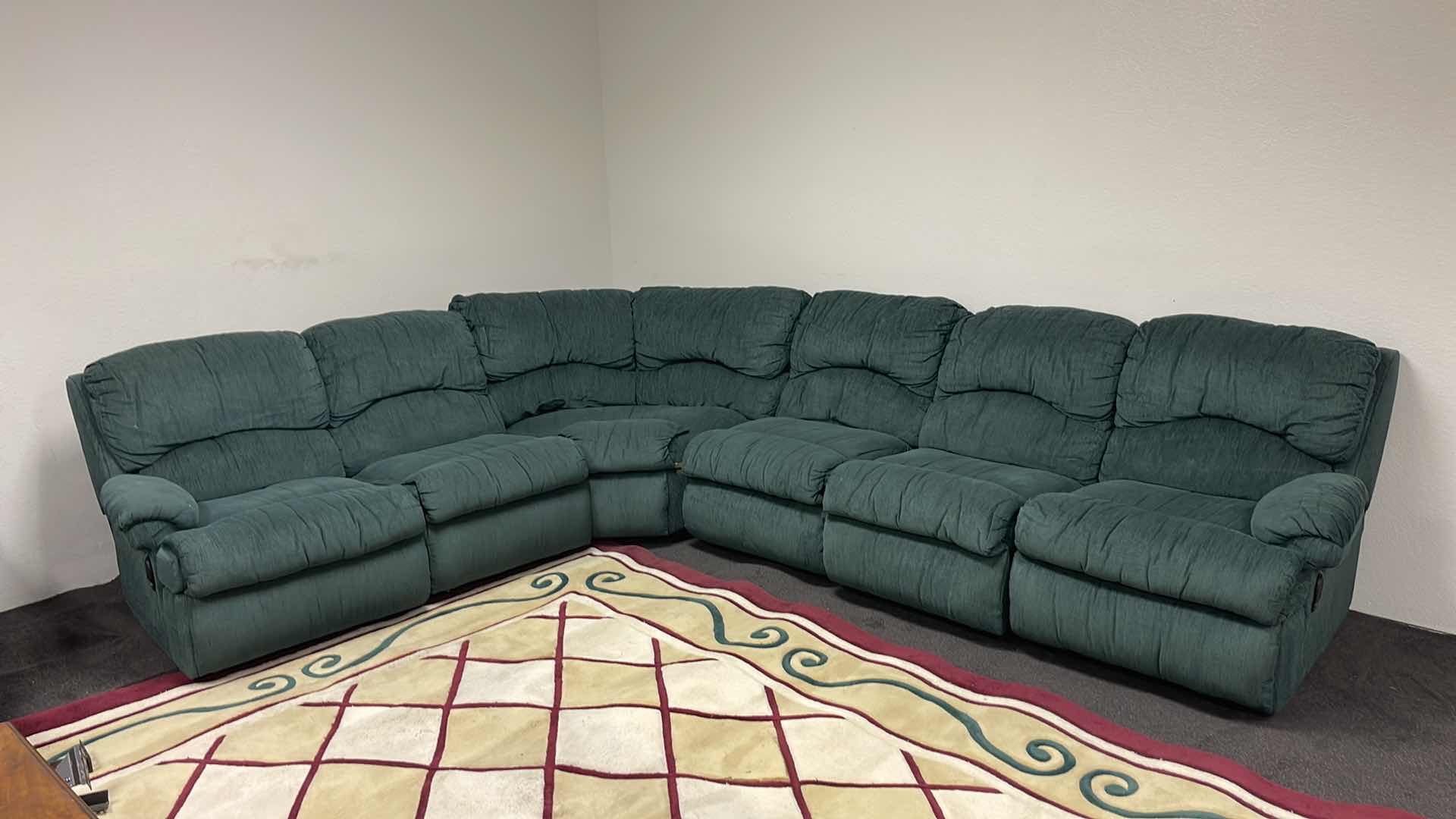 Photo 1 of GREEN SECTIONAL RECLINING SOFA 125” X 95”
