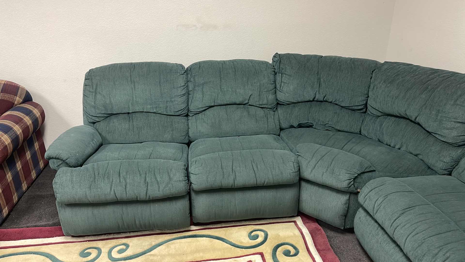 Photo 2 of GREEN SECTIONAL RECLINING SOFA 125” X 95”