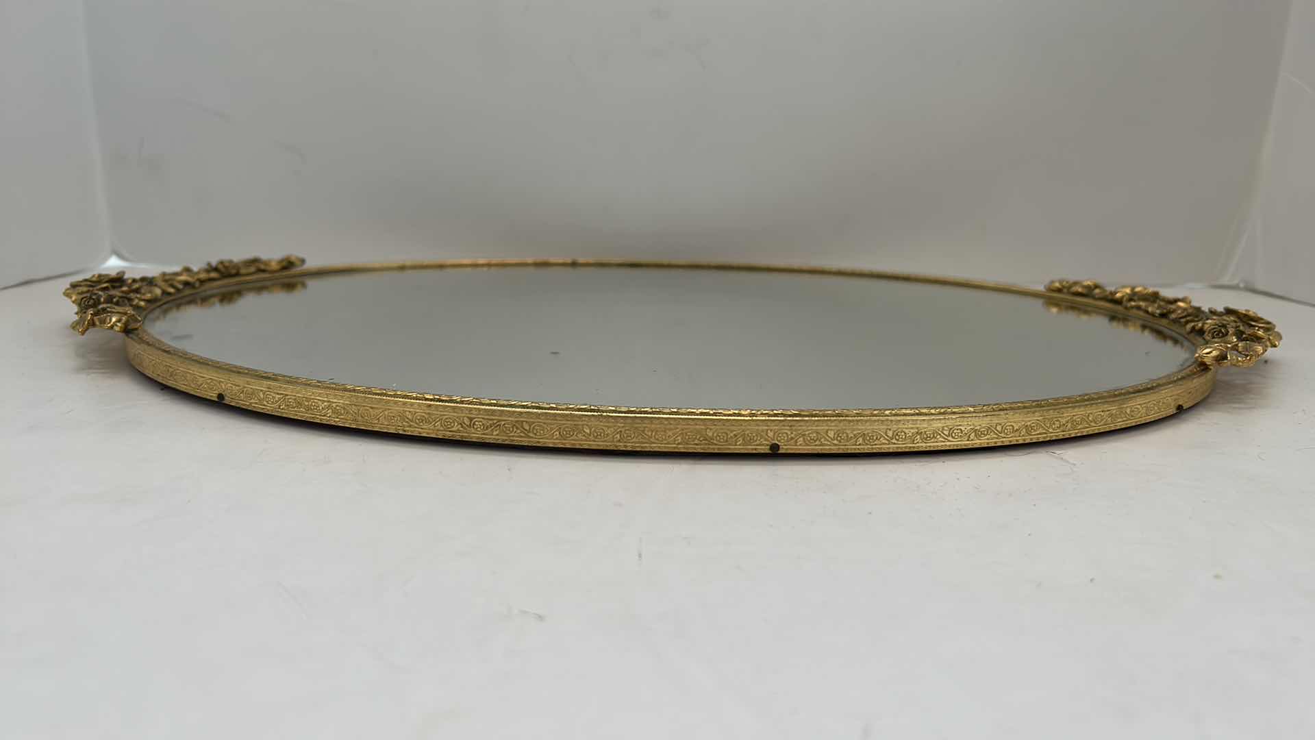 Photo 2 of VINTAGE BRASS FRAMED MIRROR W FELT BOTTOM FOR TOP OF DRESSER OR VANITY 18.5” x 11”