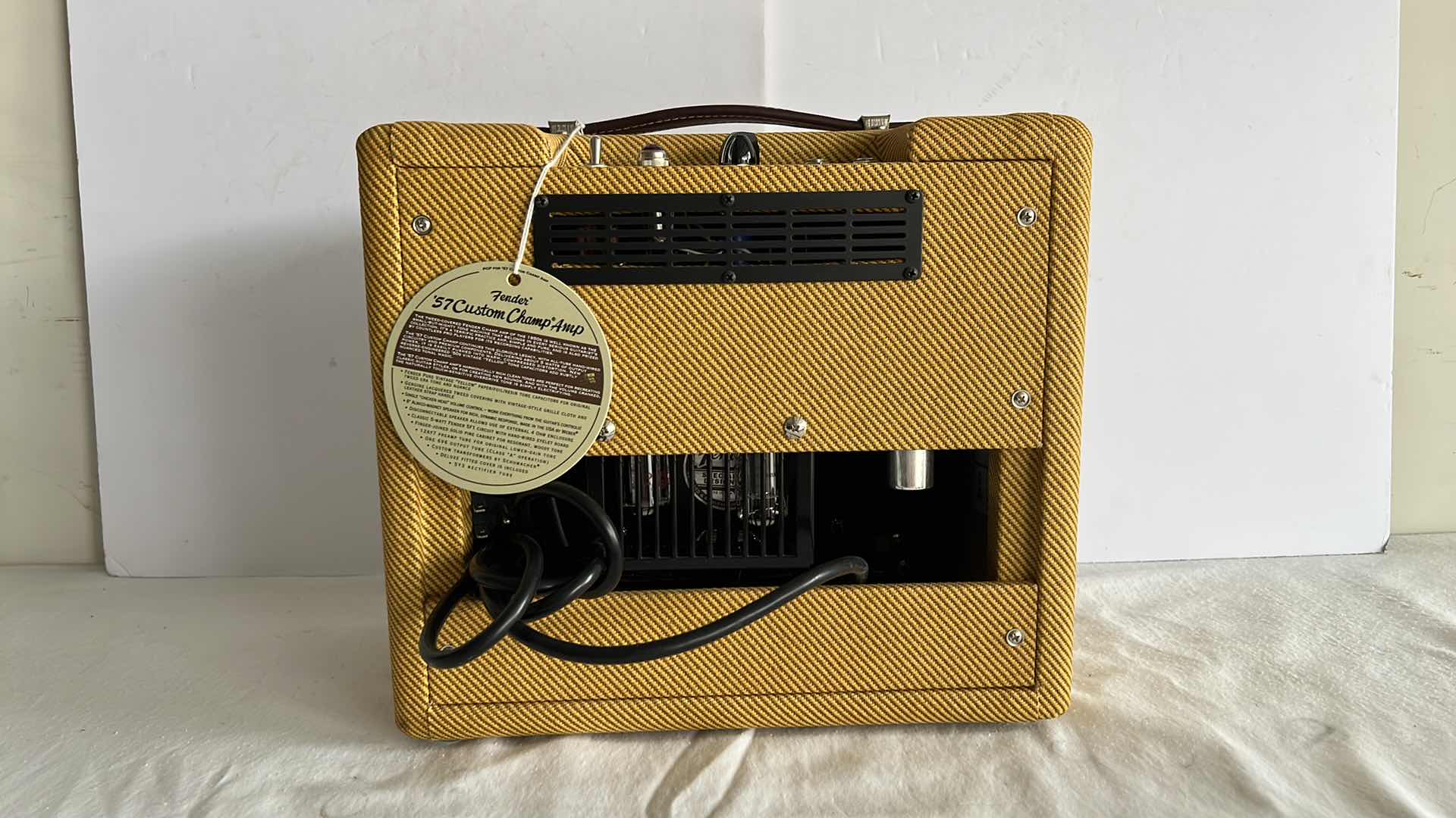 Photo 11 of FENDER '57 CUSTOM CHAMP TUBE GUITAR AMP W LACQUERED TWEED  (13.5” x 7” H12”)