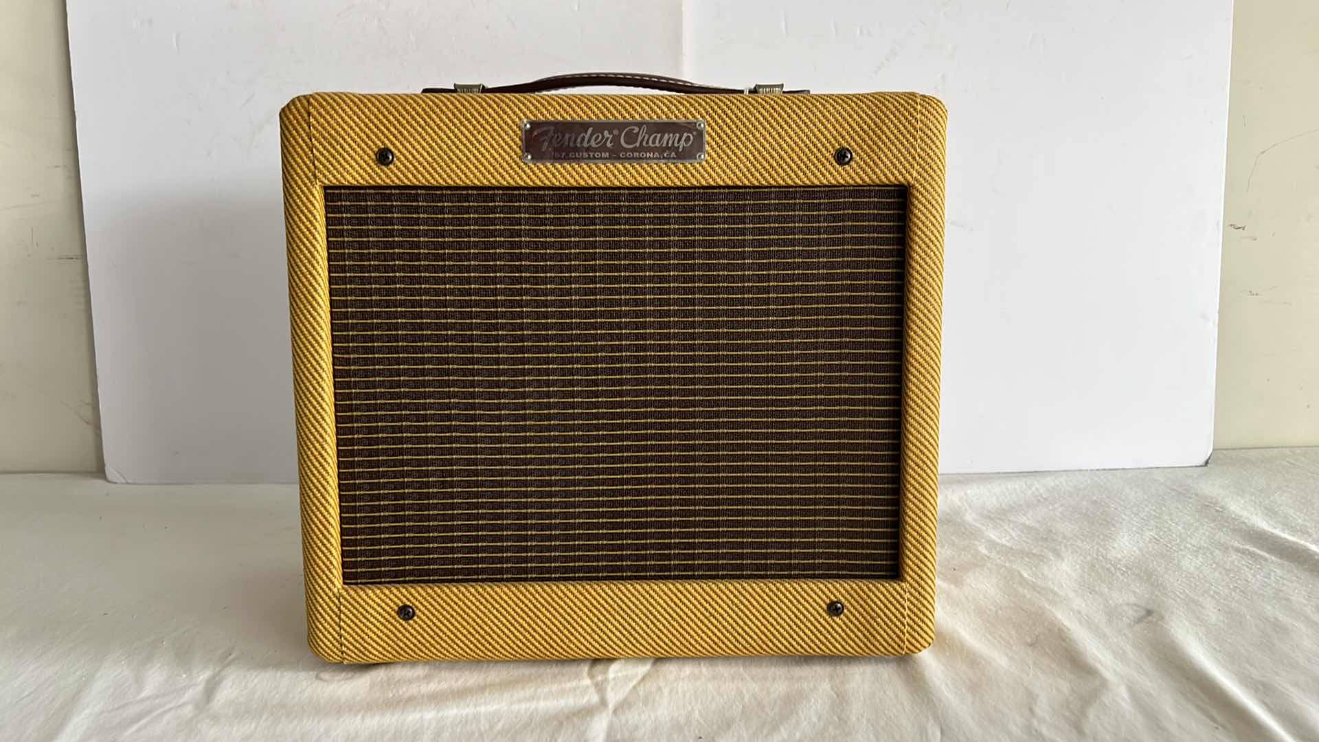 Photo 10 of FENDER '57 CUSTOM CHAMP TUBE GUITAR AMP W LACQUERED TWEED  (13.5” x 7” H12”)