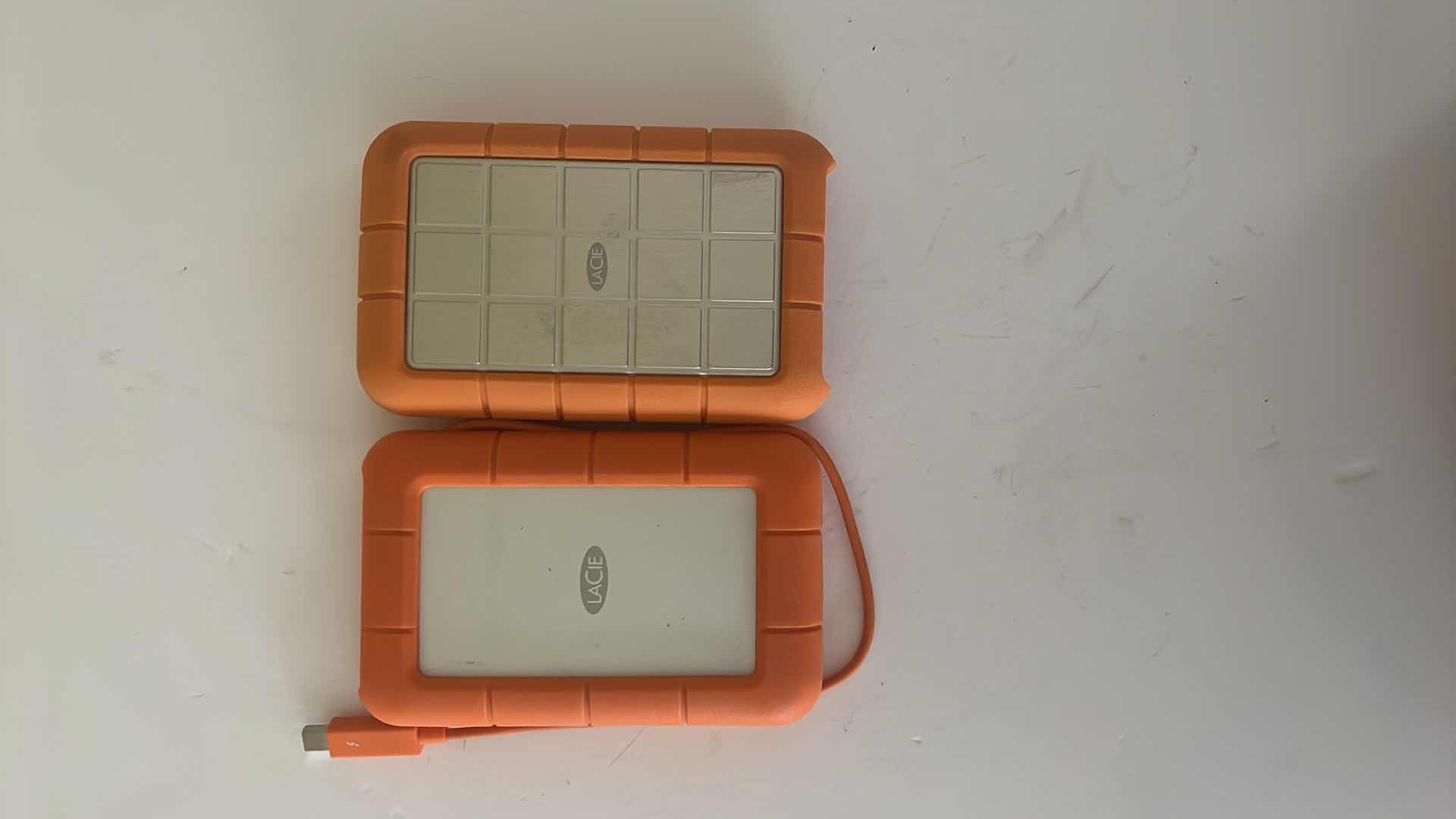 Photo 1 of 2- LaCie RUGGED MINI EXTERNAL HARD DRIVE PORTABLE HDD W ORANGE CASES