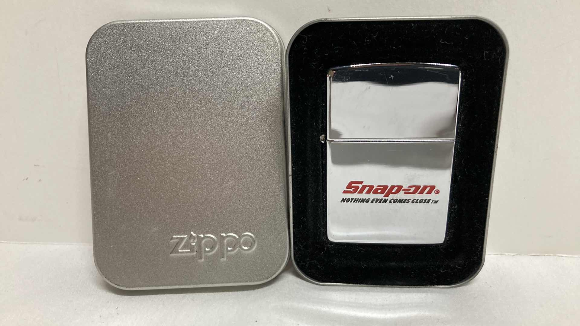 Photo 2 of ZIPPO SNAP ON LIGHTER & ZIPPO CANFOR LIGHTER W CASES