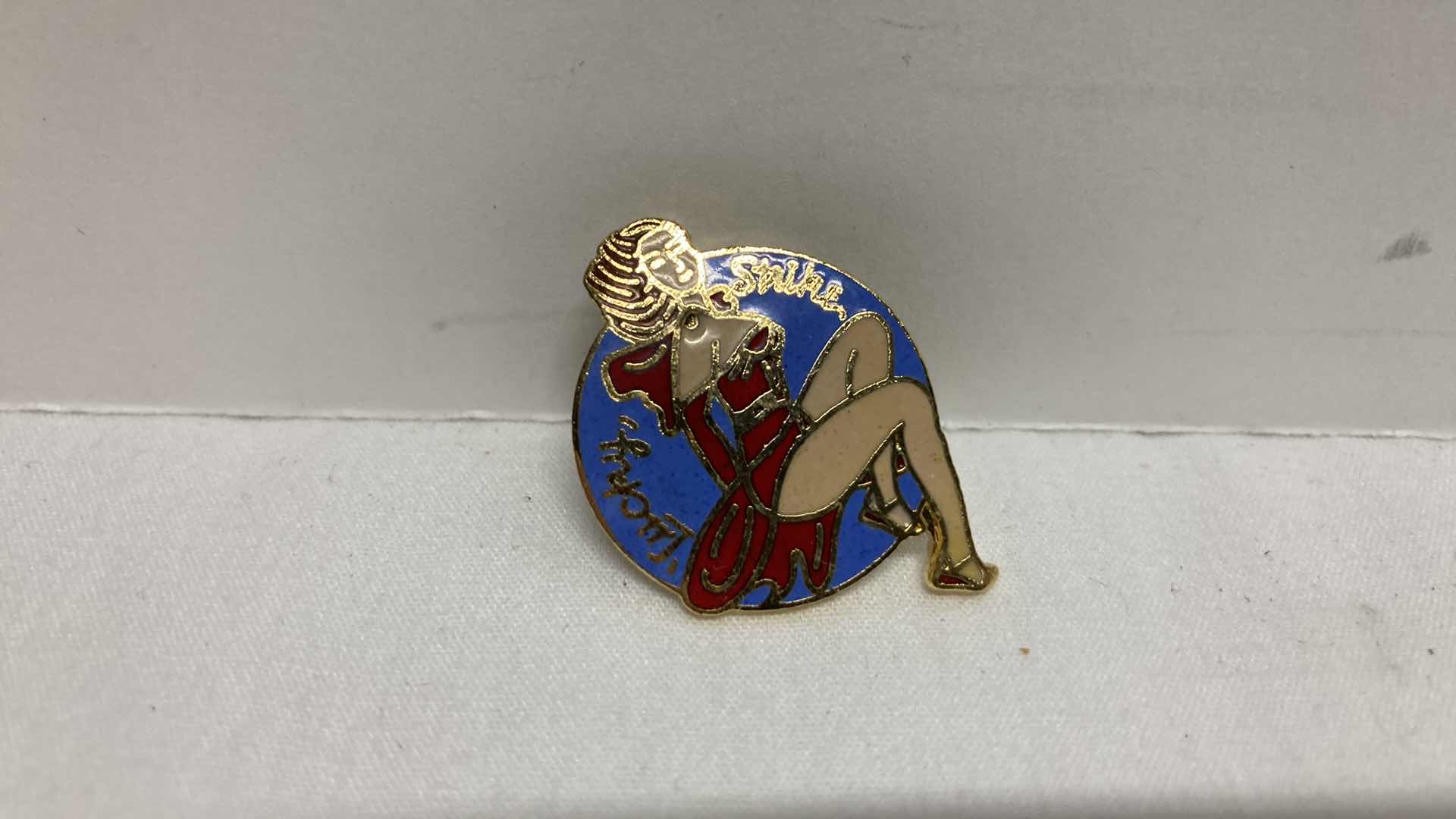 Photo 1 of VINTAGE LUCKY STRIKE GIRL PIN W CASE