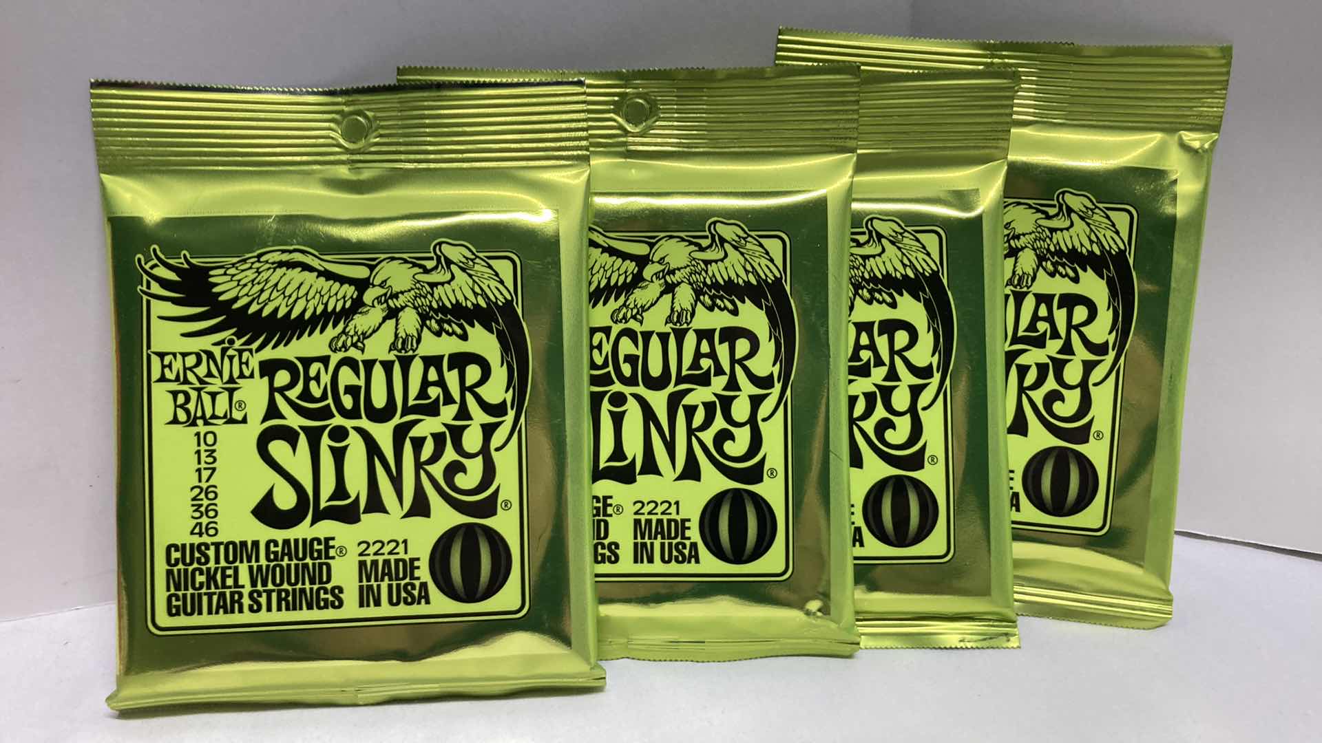 Photo 3 of NEW ERNIE BALL CUSTOM GAUGE NICKEL WOUND GUITAR STRINGS MULTI PACK (12)