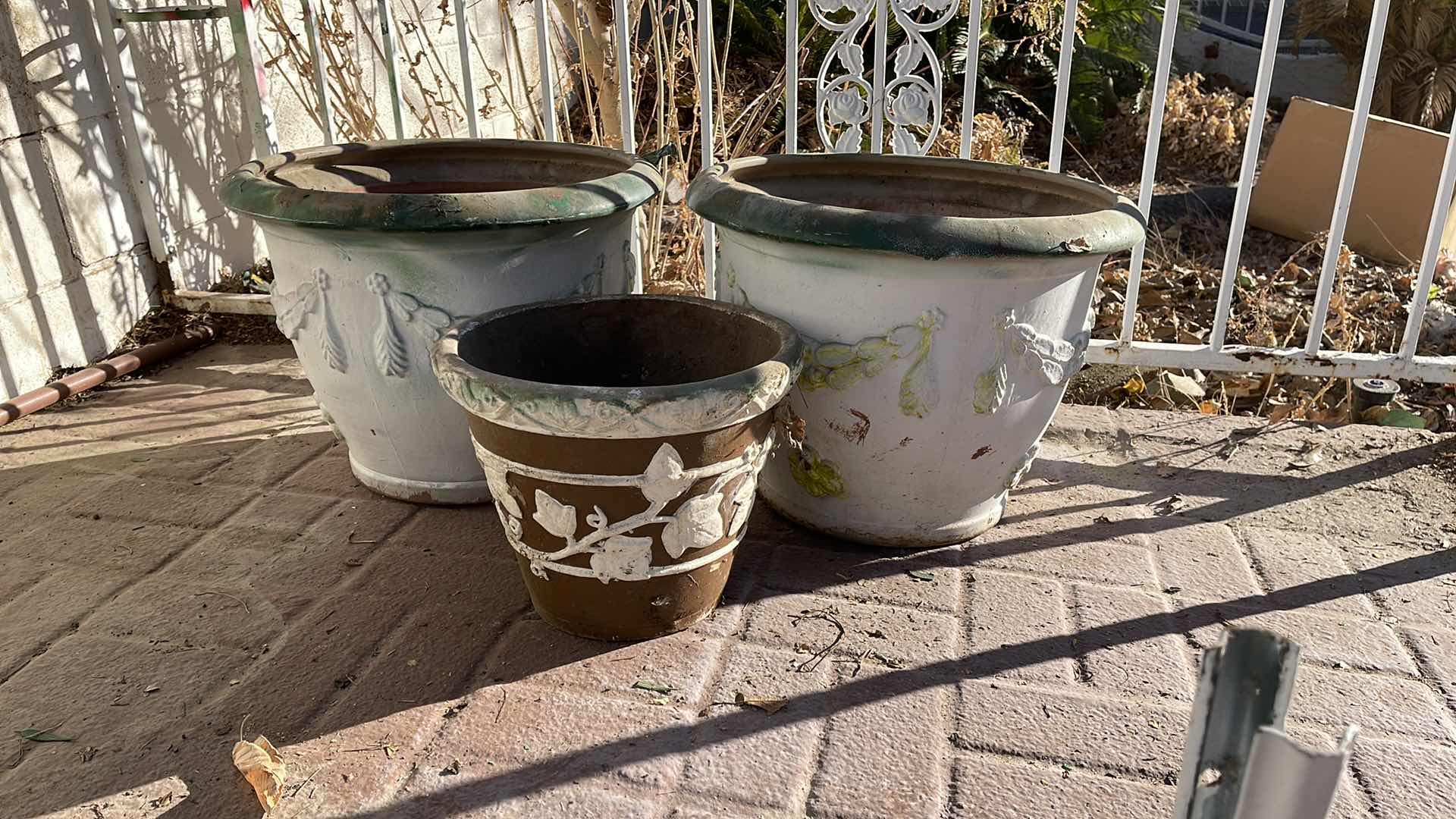 Photo 3 of TERRACOTTA 
PLANTERS AND SMALLER ONE RESIN