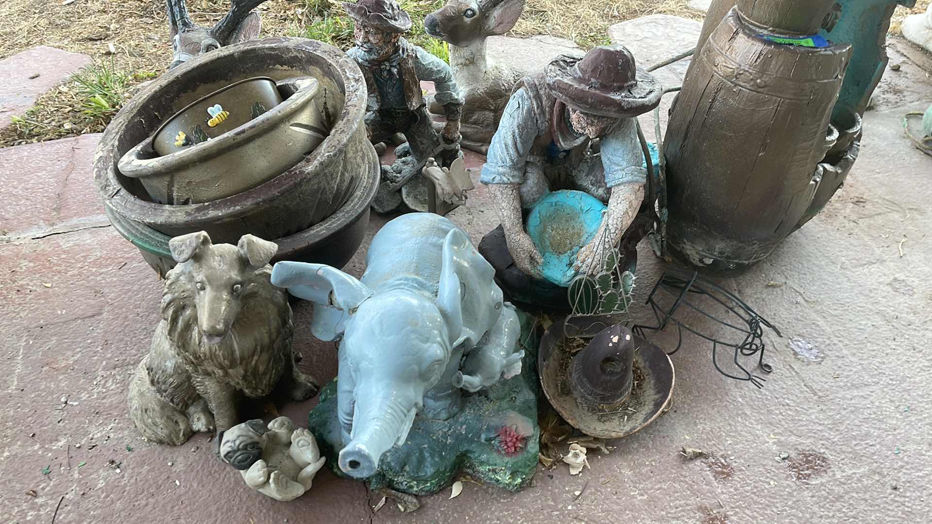 Photo 2 of FOUNTAIN APPROX 30” H & ASSORTED LAWN DECOR 
AS IS CONDITION