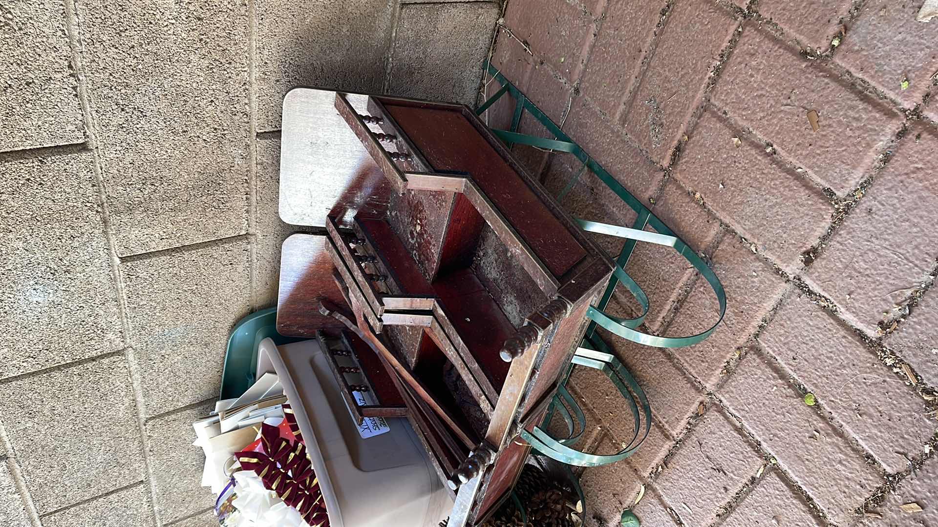 Photo 2 of TWO DECORATIVE WOOD AND METAL SLEDS (L-26”), ARTISTIC PINECONE TREE, & LARGE PLASTIC BIN FULL OF CHRISTMAS ACCOUTERMENT.