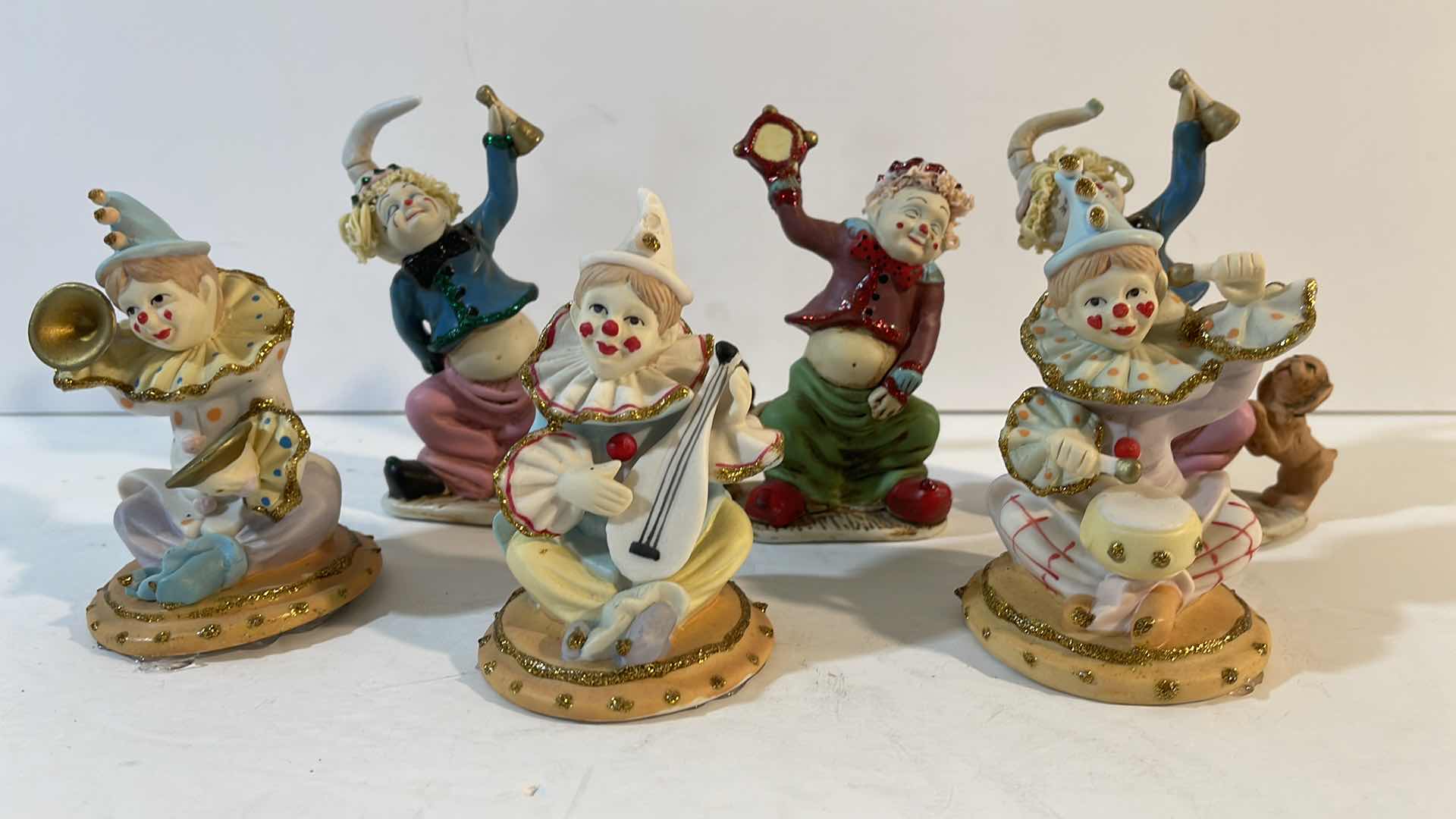 Photo 1 of CLOWN COLLECTION PORCELAIN FIGURINES H-5”