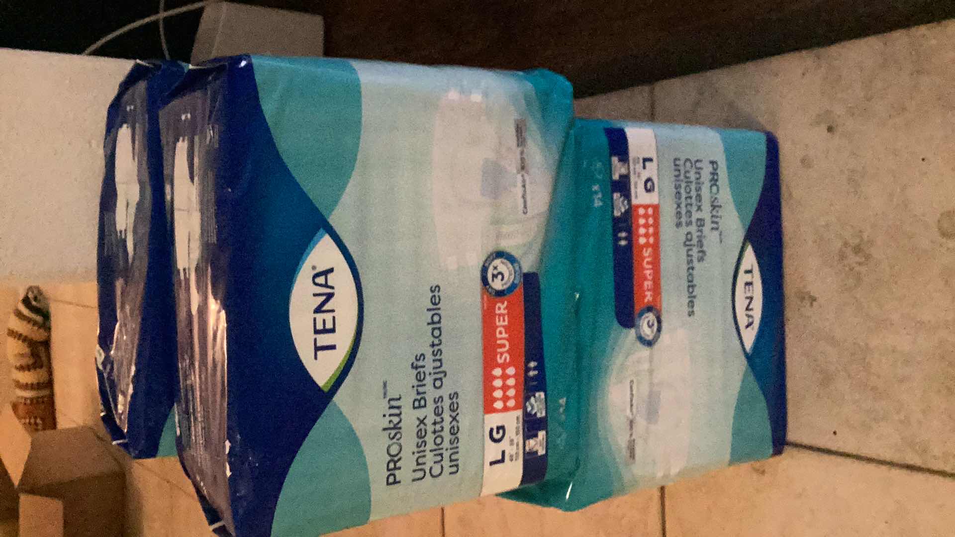Photo 1 of TENA PRO SKIN UNISEX BRIEFS // ADULT DIAPERS- LARGE