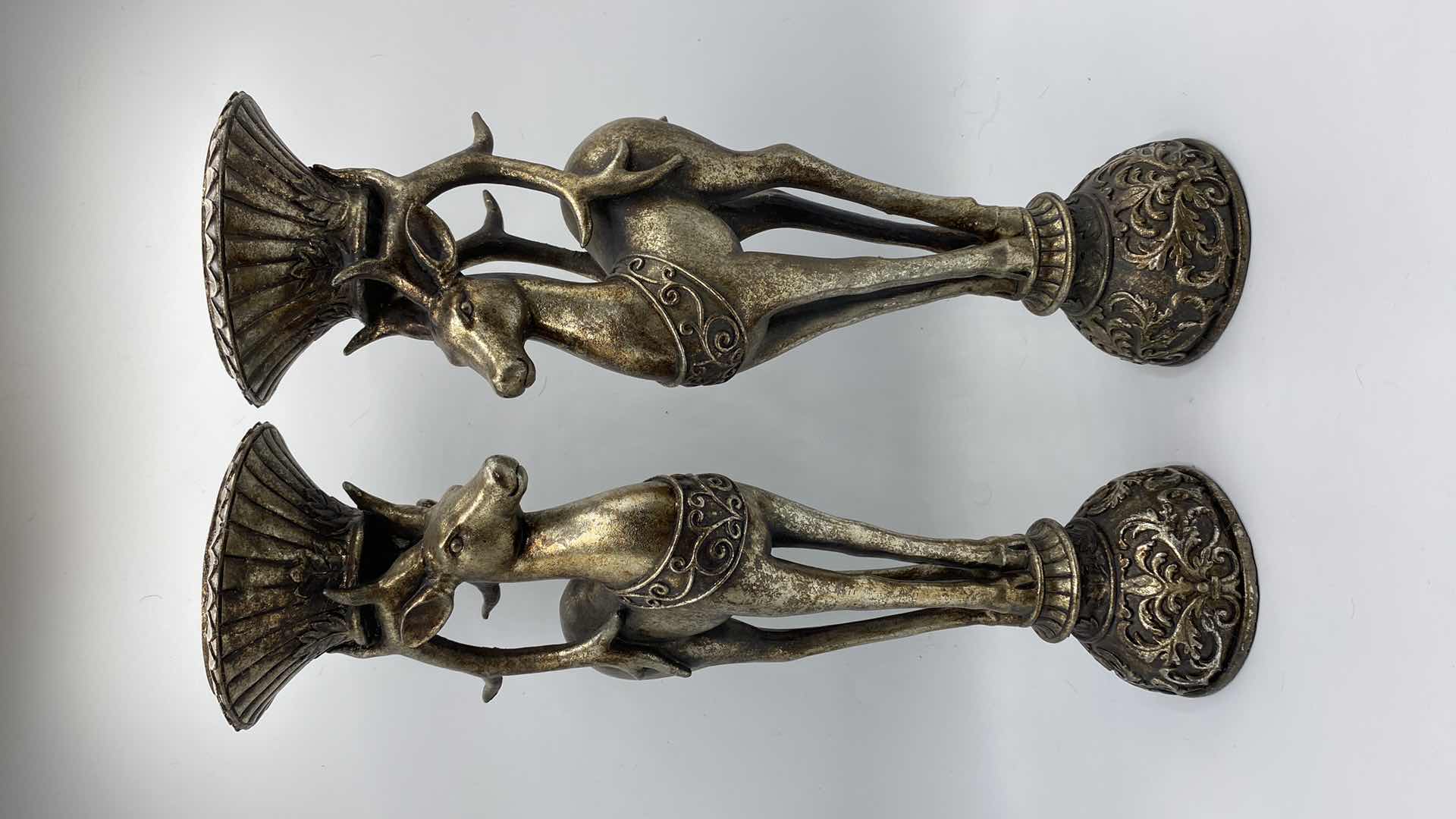 Photo 1 of PAIR OF RESIN REINDEER CANDLESTICKS H16”