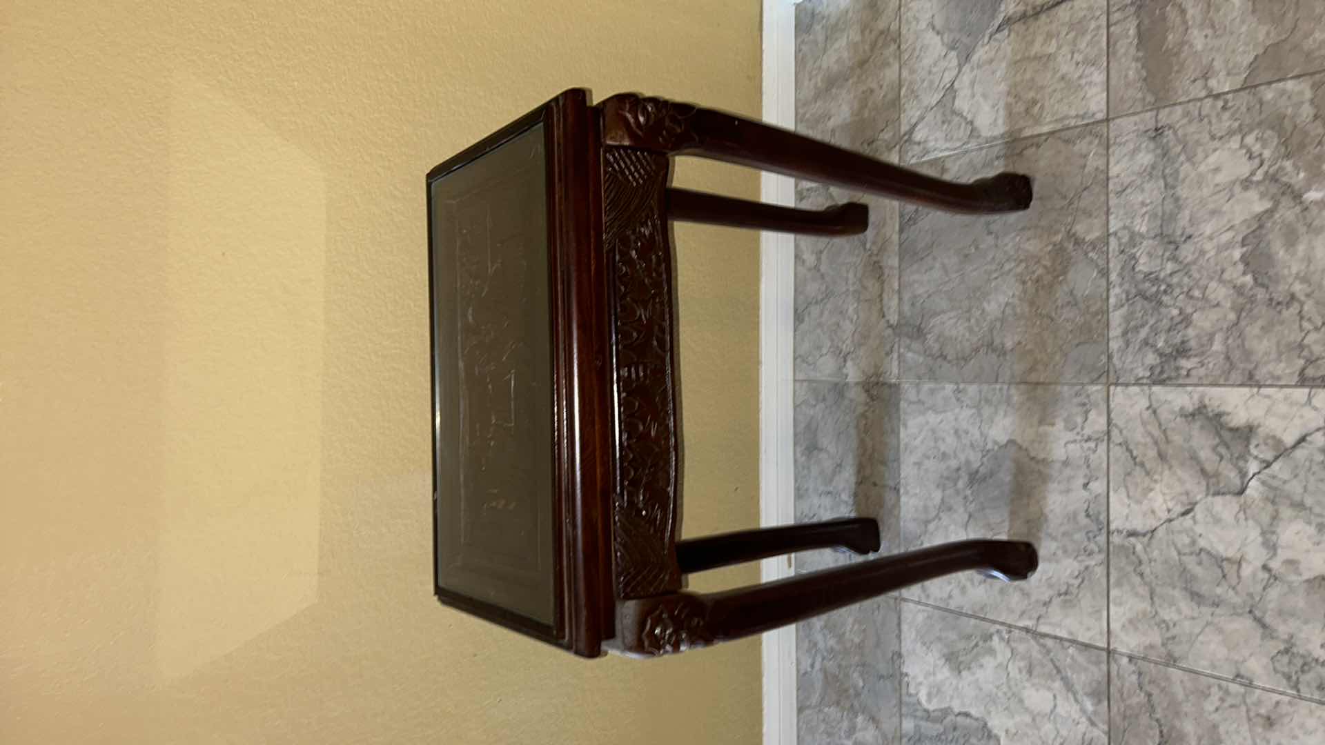 Photo 2 of CARVED WOOD TABLE WITH GLASS TOP, 19” x 12” H27”