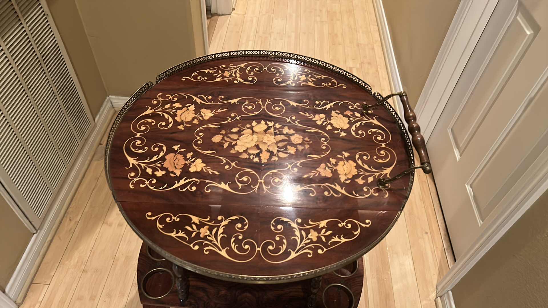 Photo 4 of VINTAGE ITALIAN SORRENTO WOOD DROP LEAF TABLE WITH INLAID COCKTAIL CART TABLE OPENED 30” ROUND CLOSED 30” x 17.5” x H27”
TABLETOP NEEDS GLUE)