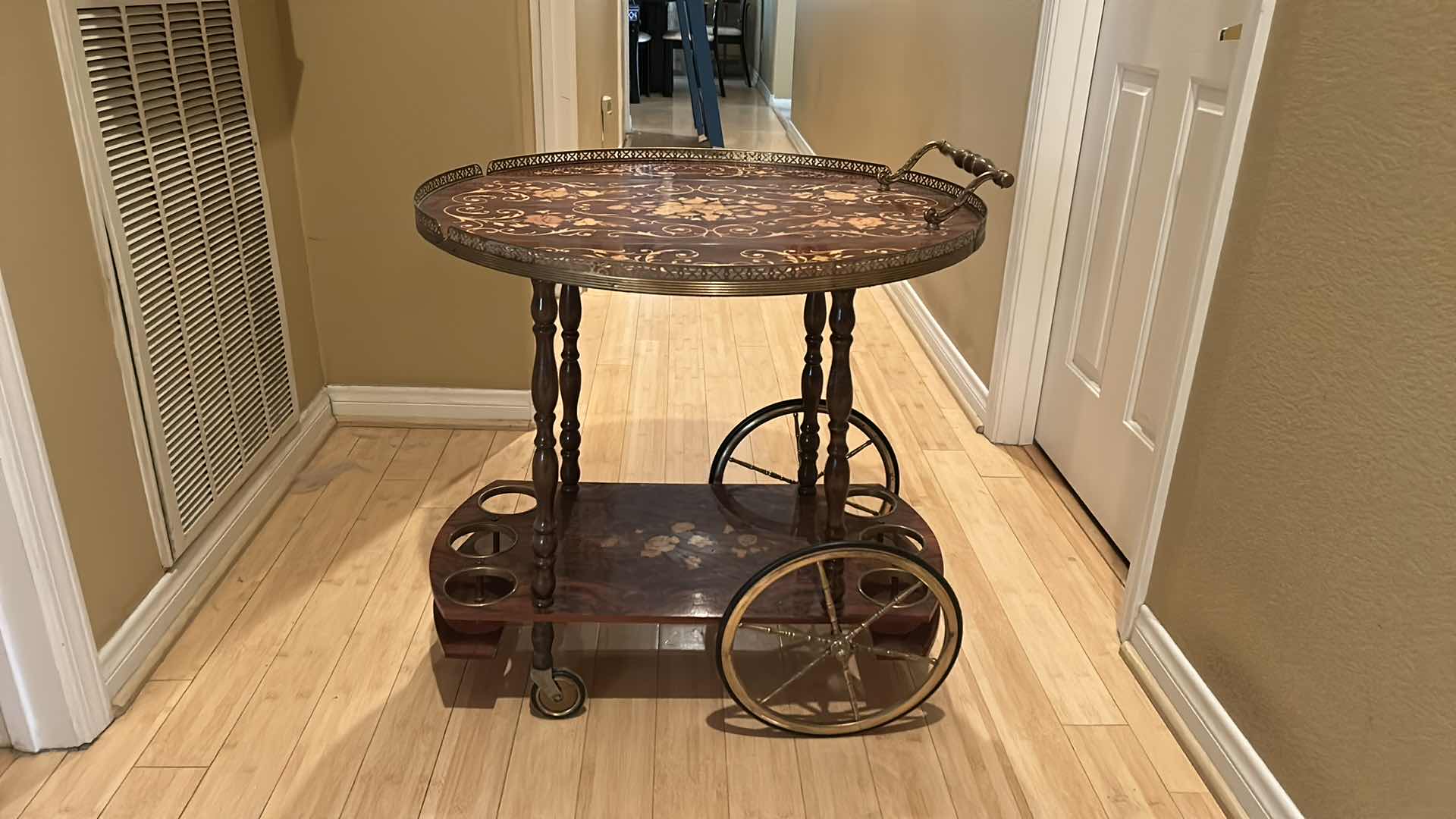 Photo 2 of VINTAGE ITALIAN SORRENTO WOOD DROP LEAF TABLE WITH INLAID COCKTAIL CART TABLE OPENED 30” ROUND CLOSED 30” x 17.5” x H27”
TABLETOP NEEDS GLUE)