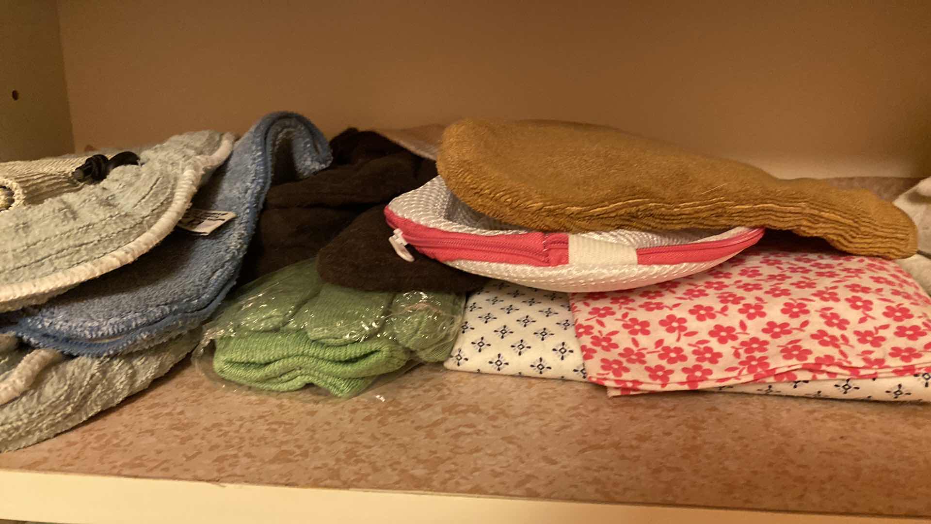 Photo 3 of CONTENTS OF  LAUNDRY ROOM CABINET CLOTHS