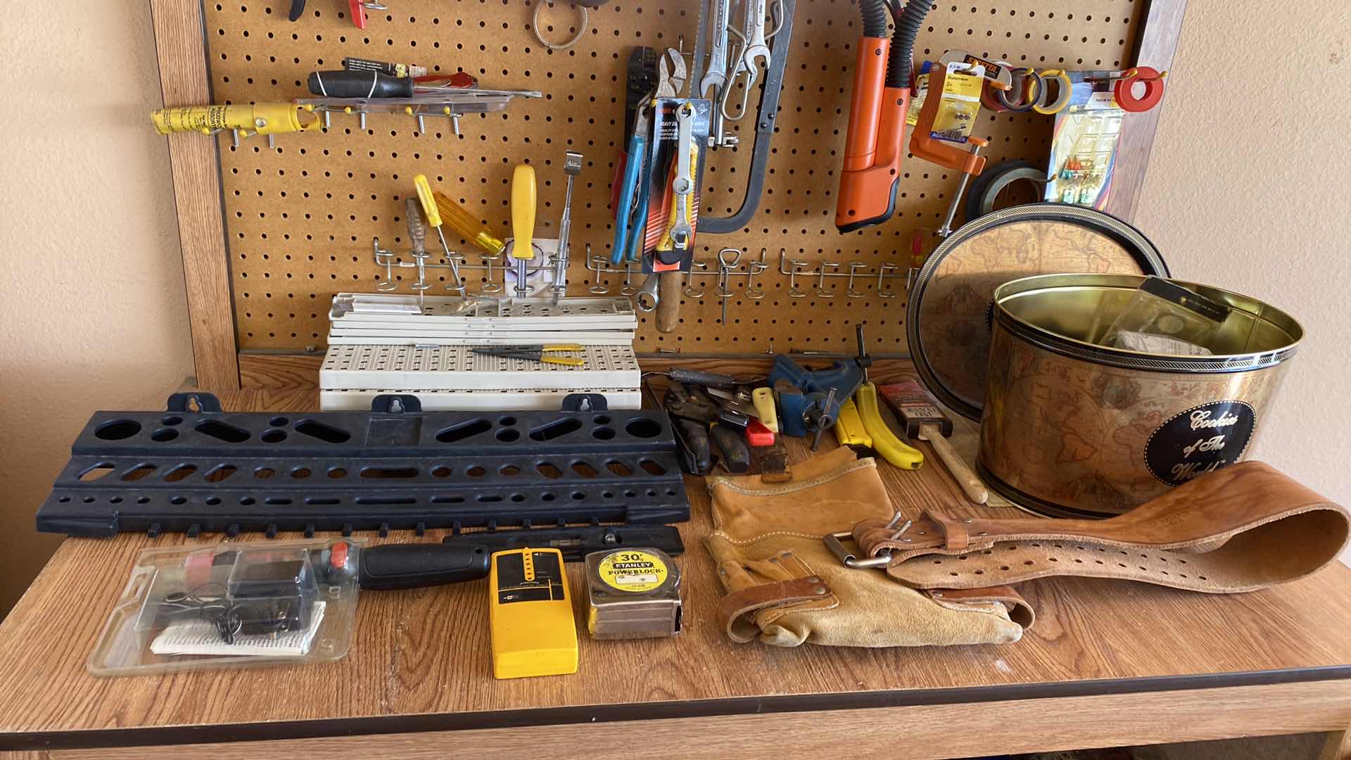 Photo 1 of TOOLS ON WALL AND TOP SHELF OF CABINET GARAGE