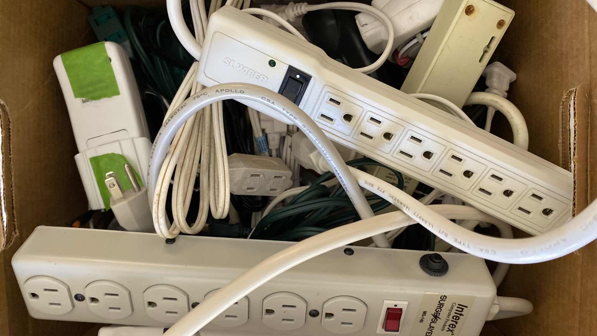 Photo 1 of BOX OF POWER STRIPS AND EXTENSION CORDS