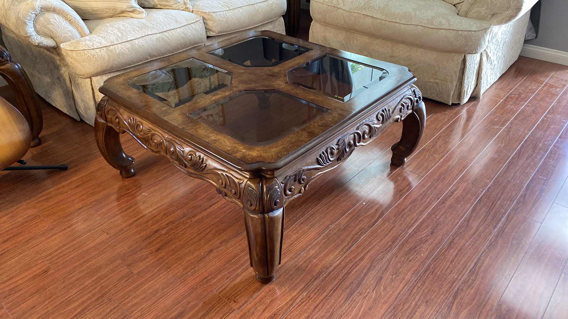 Photo 1 of SOLID ORNATE WOOD END TABLE WITH BEVELED GLASS 40” X 40” H19.5”